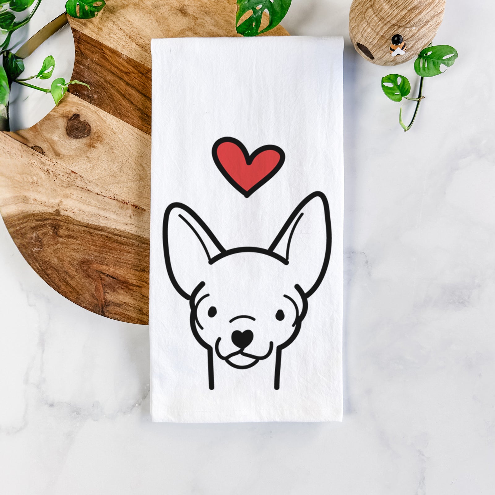 Minimalist line drawing of a Chihuahua with a red heart on a tea towel