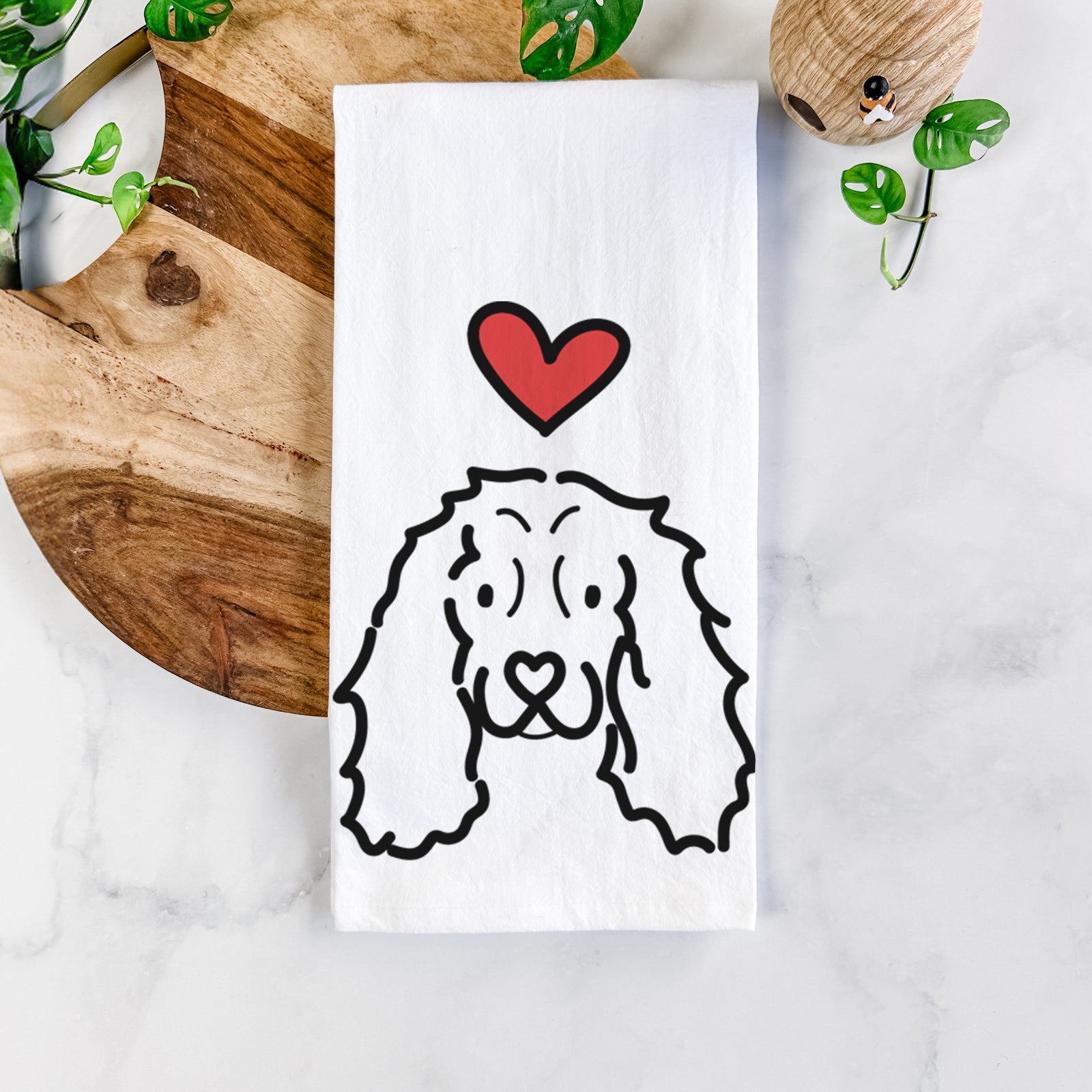 Minimalist line drawing of an American Cocker Spaniel with a red heart on a tea towel