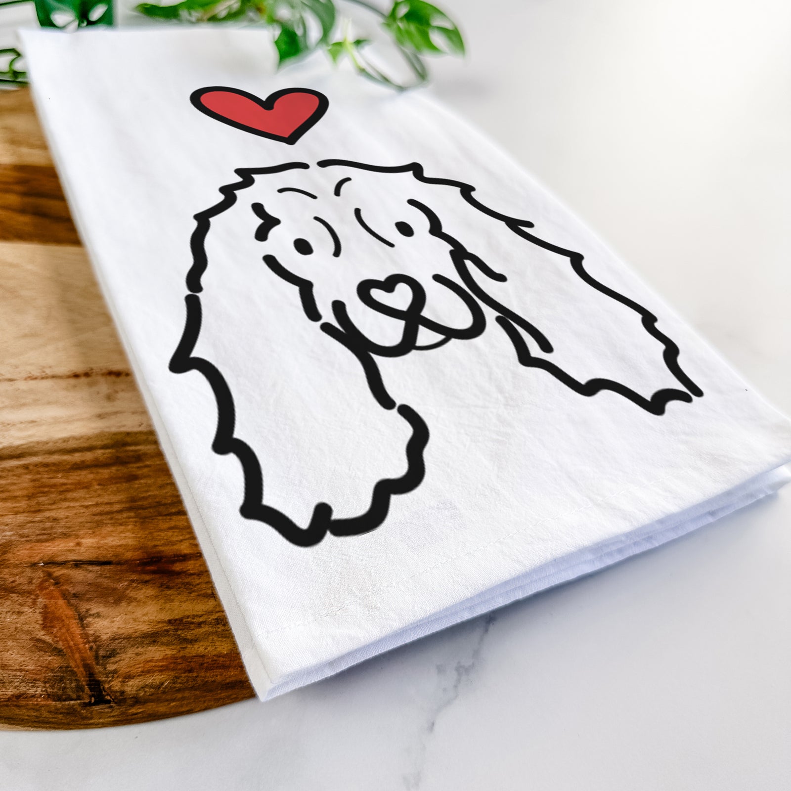 Minimalist line drawing of an American Cocker Spaniel with a red heart on a tea towel