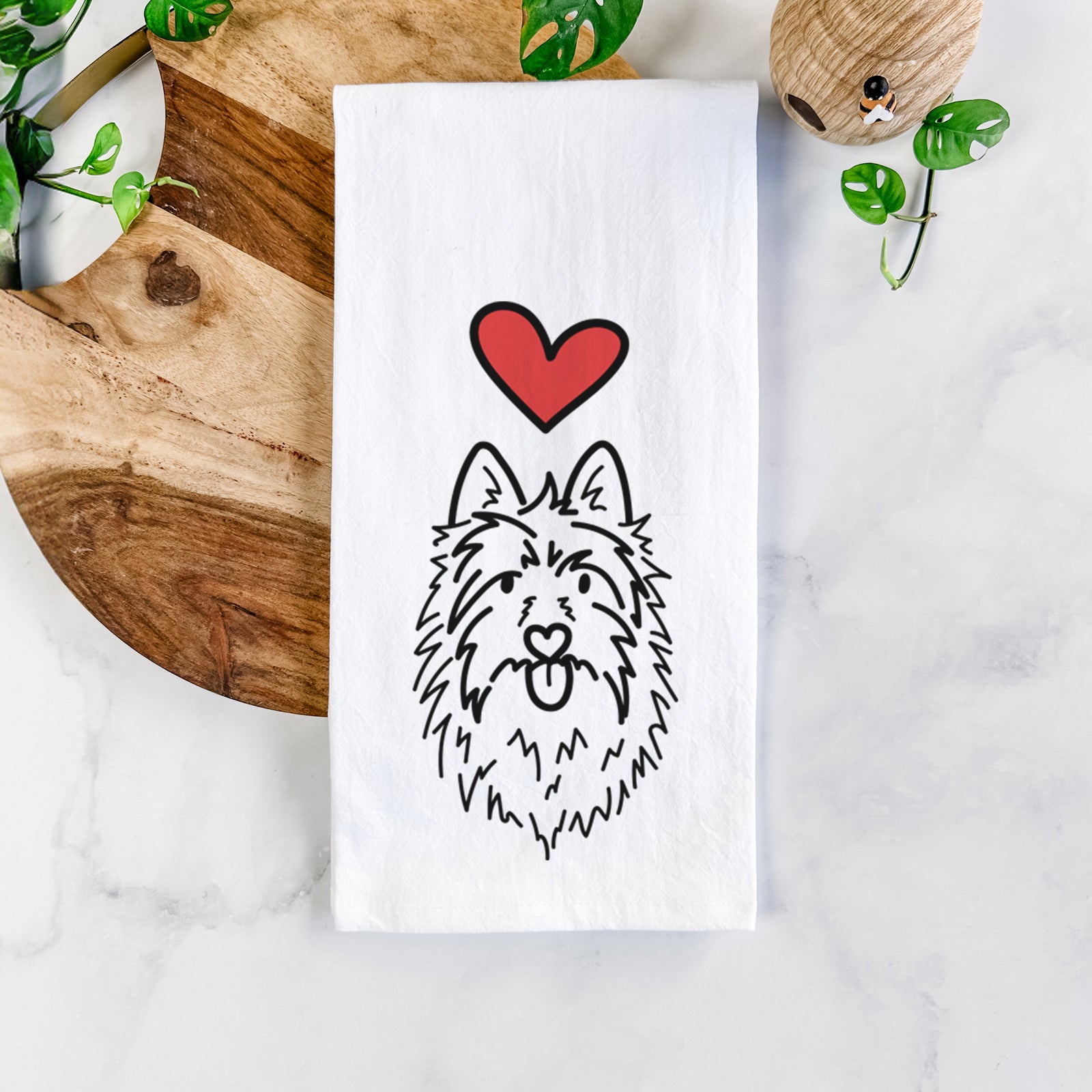 Minimalist line drawing of Digger the Australian Terrier with a red heart on a tea towel