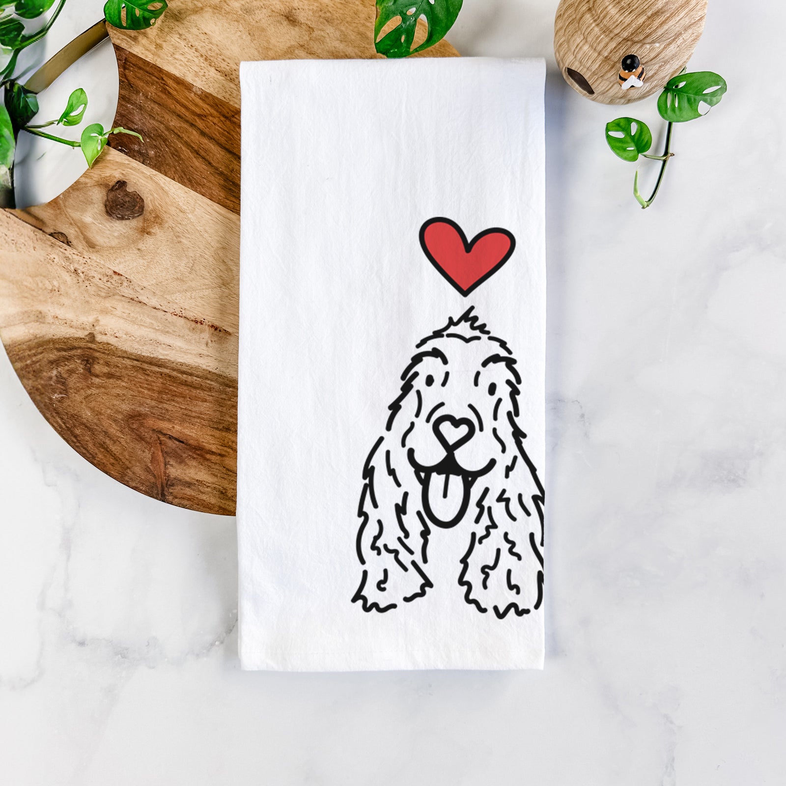 Minimalist line drawing of Dolly the English Cocker Spaniel with a red heart on a tea towel