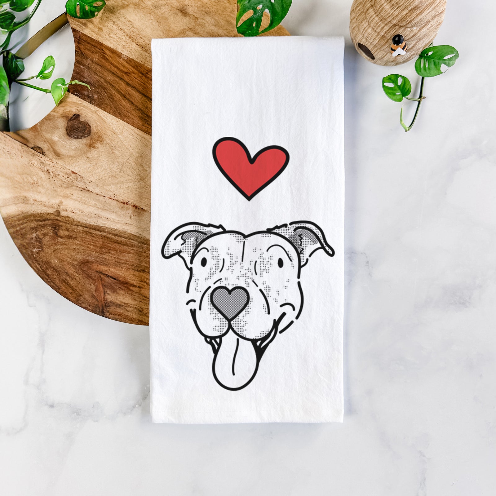 Minimalist line drawing of Dottie the Pitbull Mix with a red heart on a tea towel