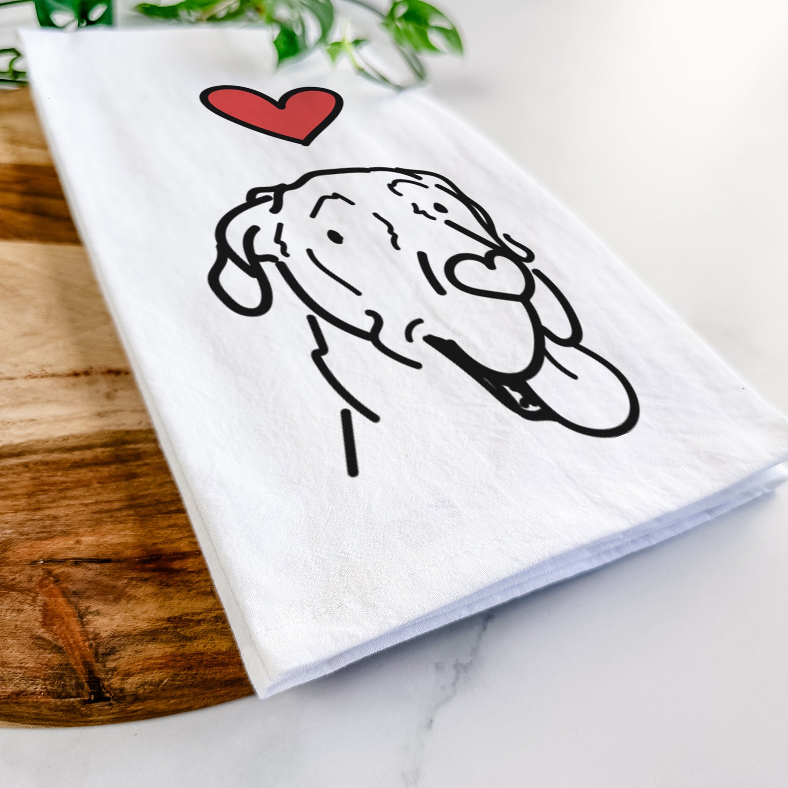 Minimalist line drawing of Duncan the Great Dane with a red heart on a tea towel