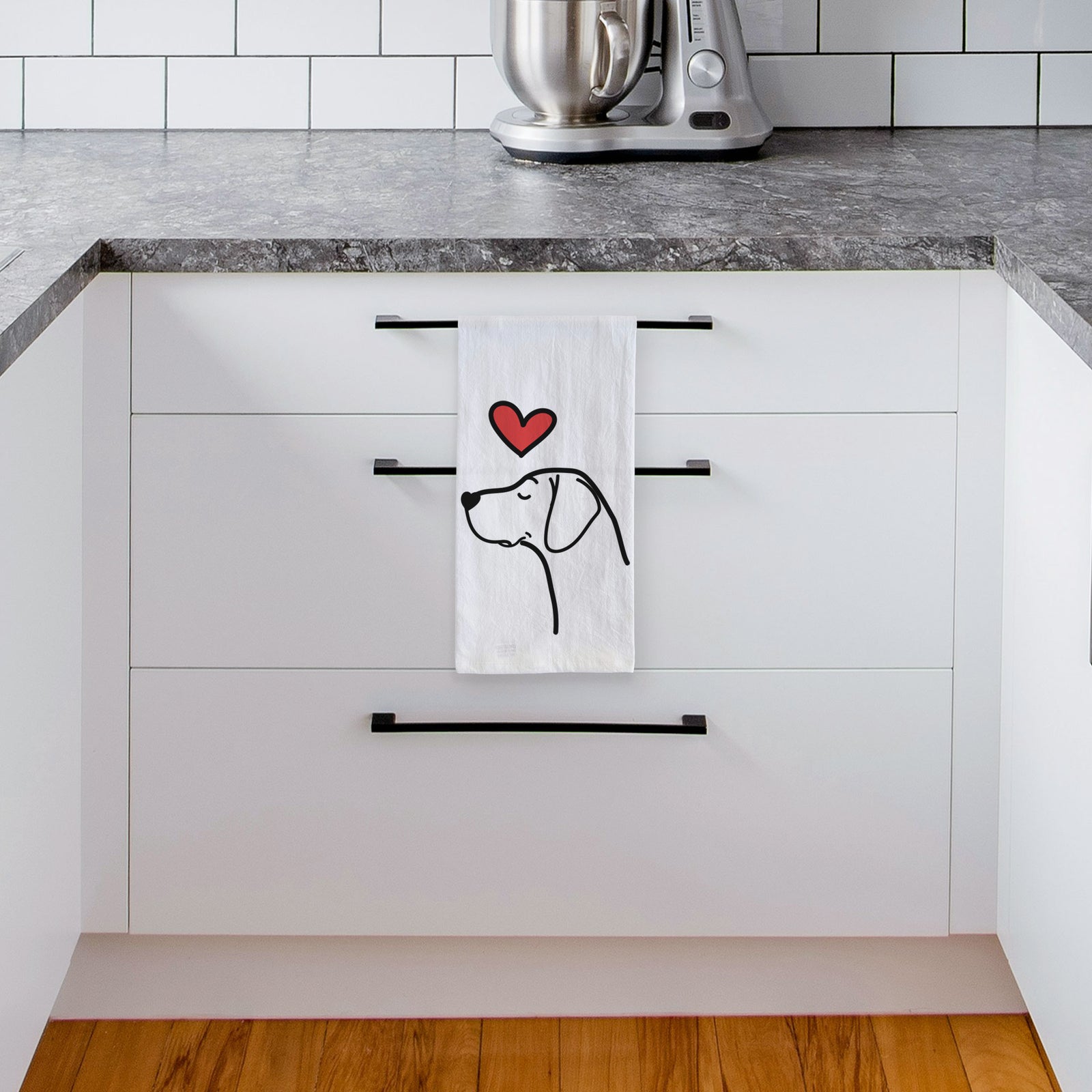 Minimalist line drawing of a German Shorthaired Pointer with a red heart on a tea towel, hanging on an oven door in a kitchen