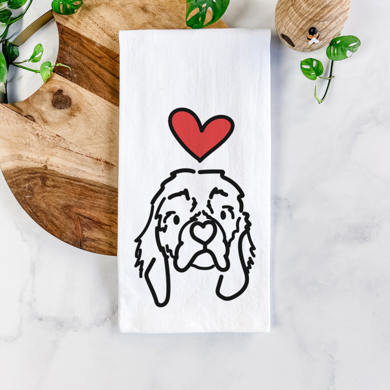 Minimalist line drawing of GiGi the Cocker Spaniel with a red heart on a tea towel