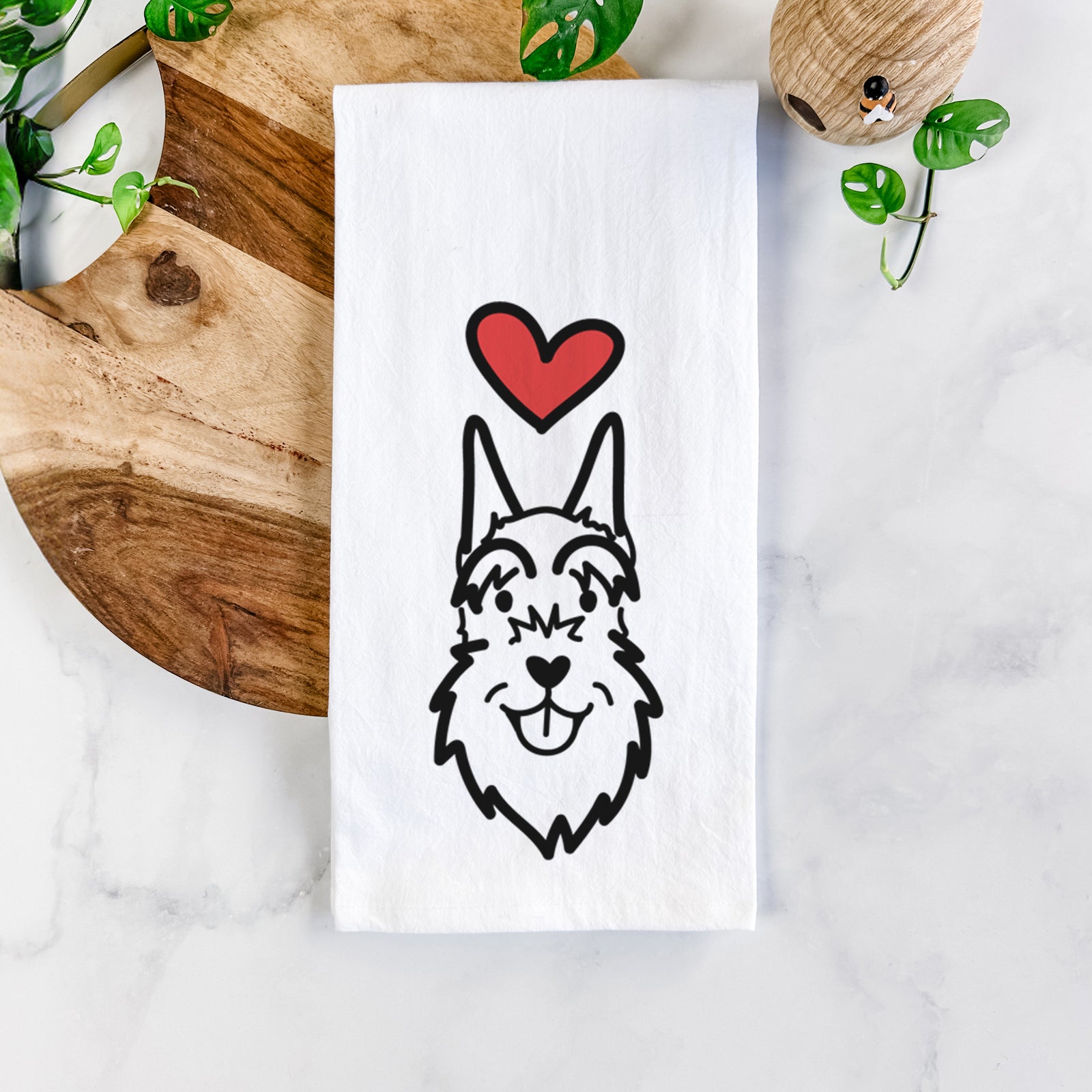 Minimalist line drawing of a Schnauzer Cropped Ears with a red heart on a tea towel
