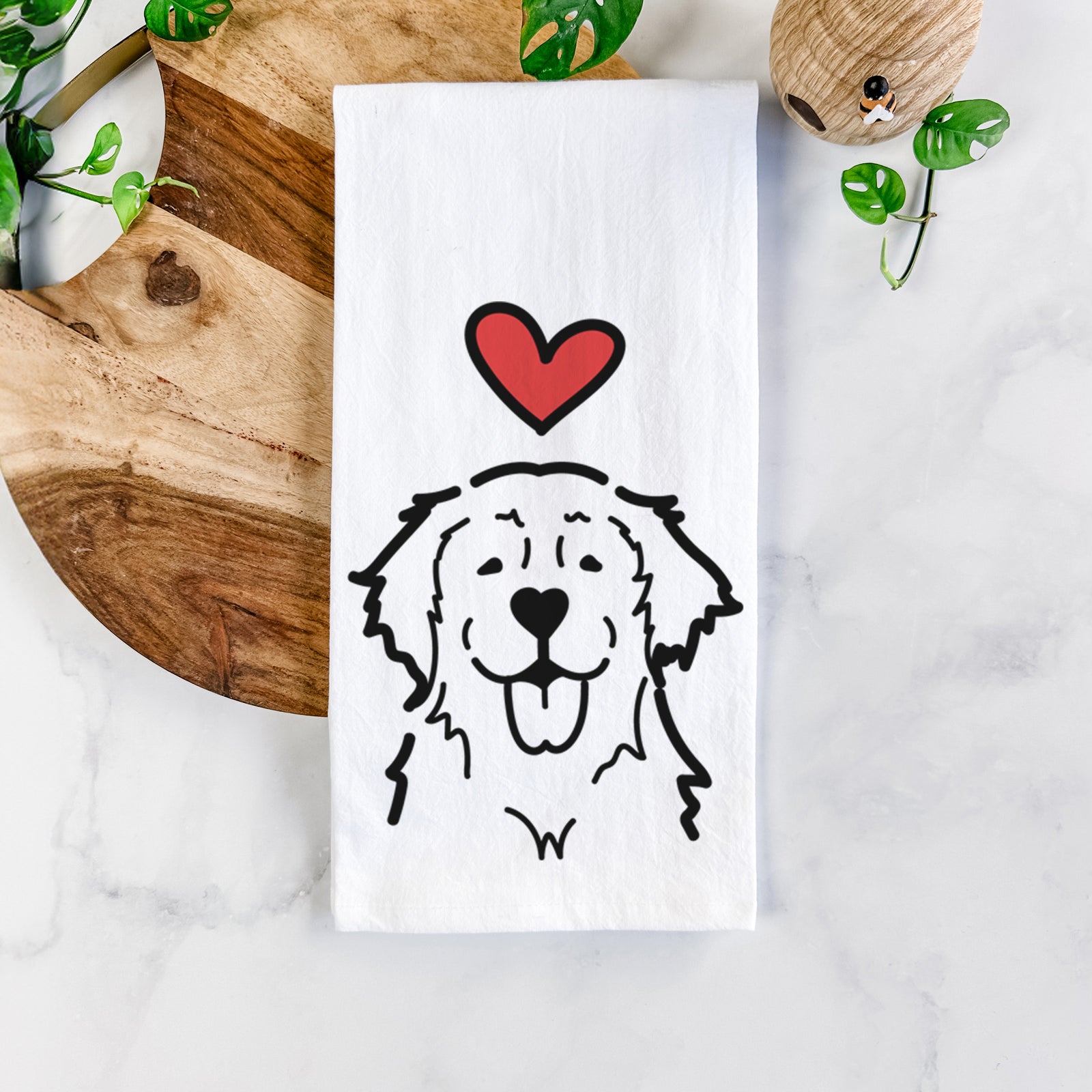 Minimalist line drawing of a Golden Retriever with a red heart on a tea towel