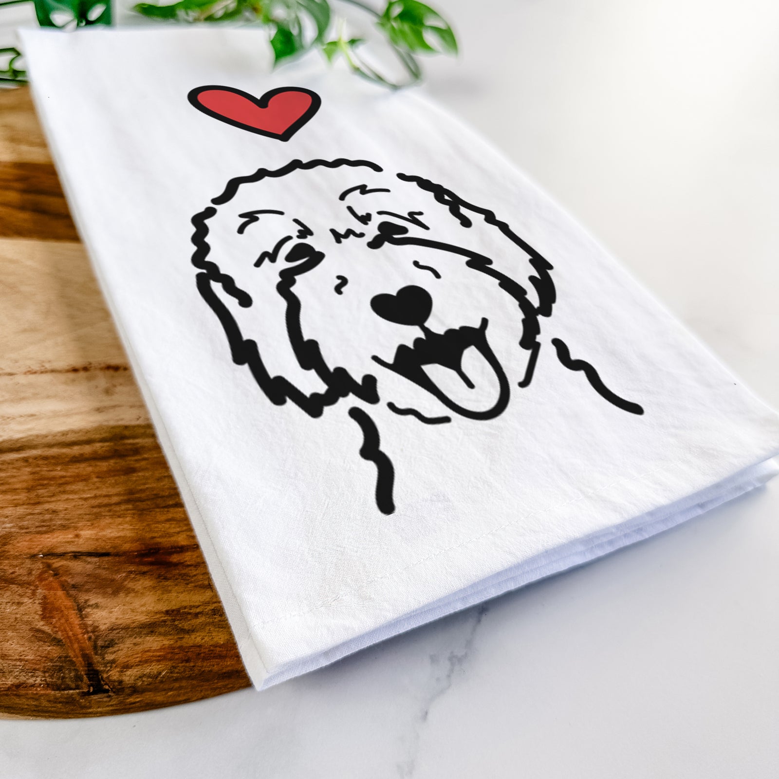 Minimalist line drawing of a Goldendoodle 2 with a red heart on a tea towel