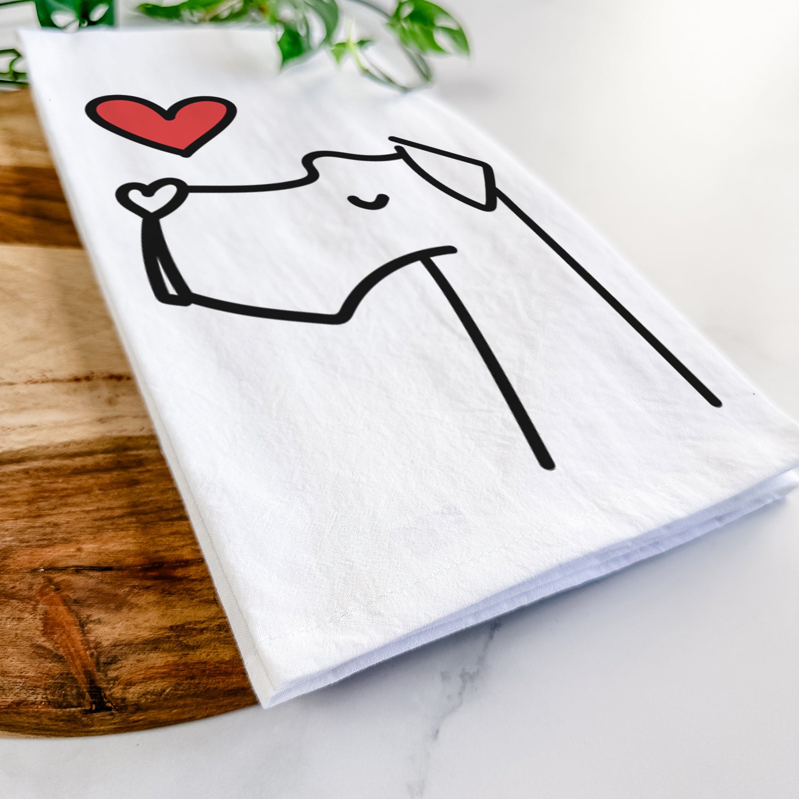 Minimalist line drawing of a Great Dane with a red heart on a tea towel