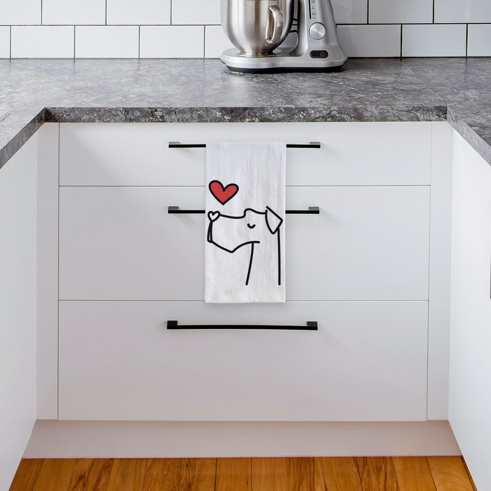 Minimalist line drawing of a Great Dane with a red heart on a tea towel, hanging on an oven door in a kitchen