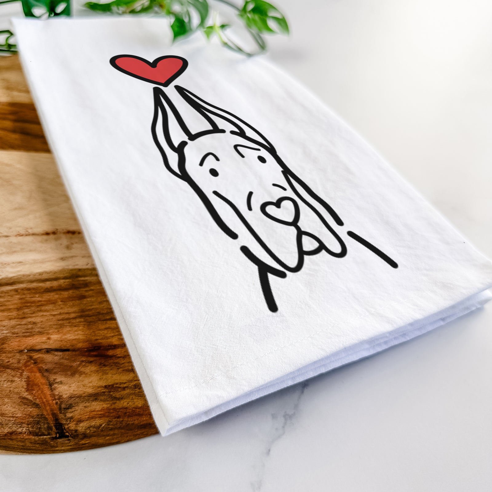 Minimalist line drawing of a Great Dane with Cropped Ears with a red heart on a tea towel