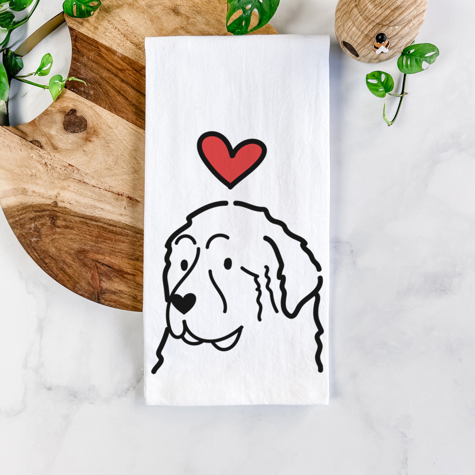 Minimalist line drawing of a Great Pyrenees with a red heart on a tea towel