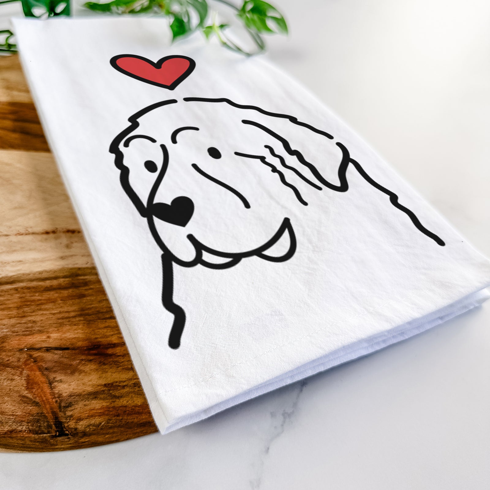 Minimalist line drawing of a Great Pyrenees with a red heart on a tea towel