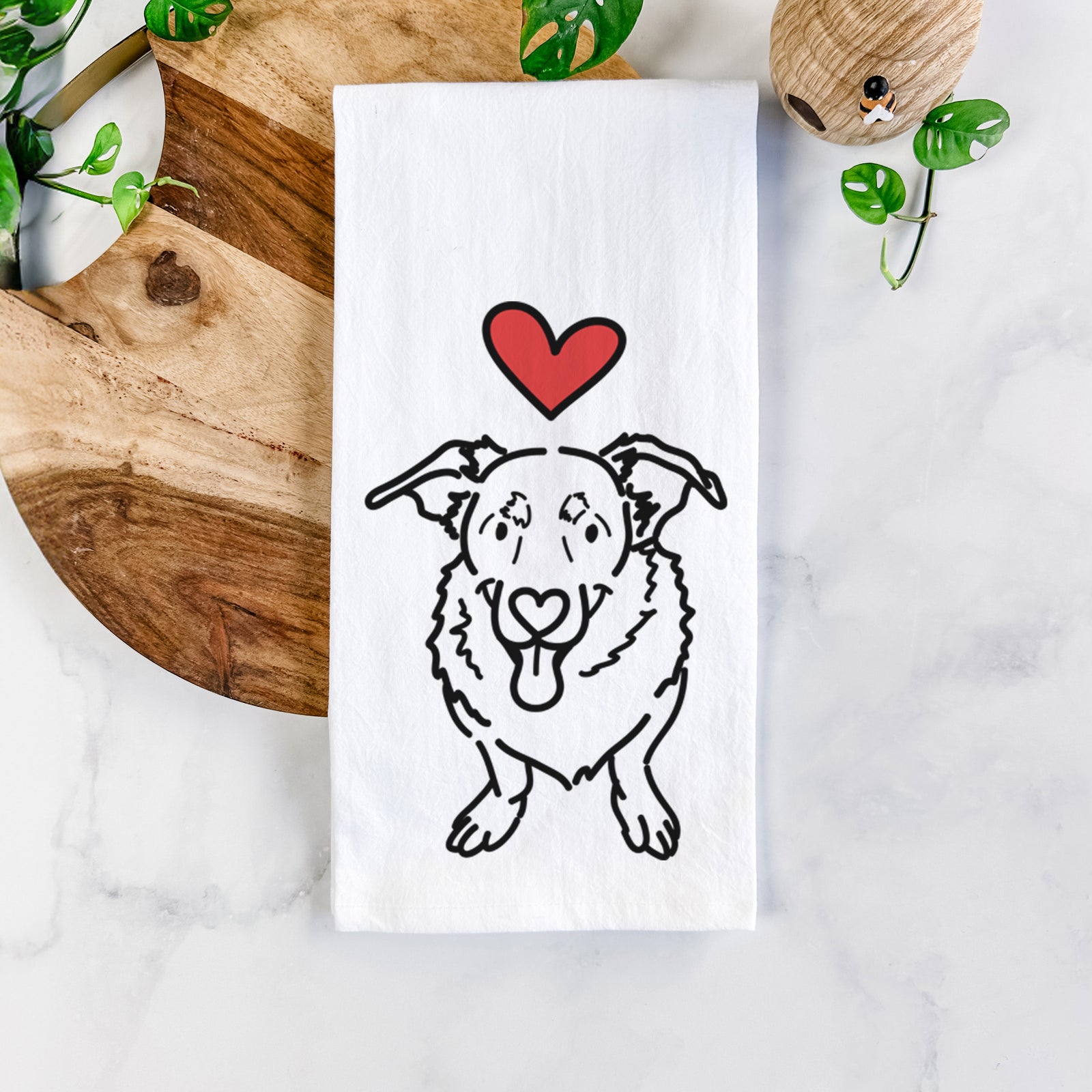 Minimalist line drawing of Gretchen the Basset Hound German Shepherd Mix with a red heart on a tea towel