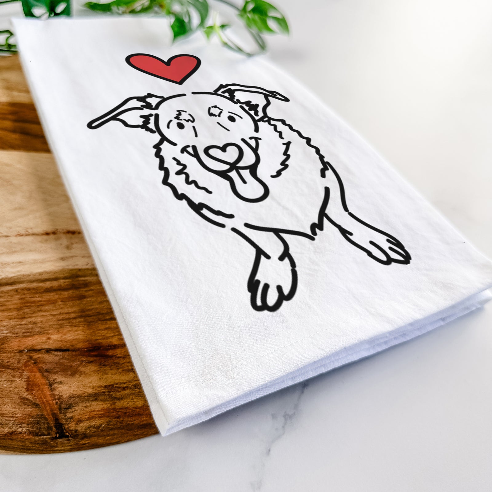 Minimalist line drawing of Gretchen the Basset Hound German Shepherd Mix with a red heart on a tea towel