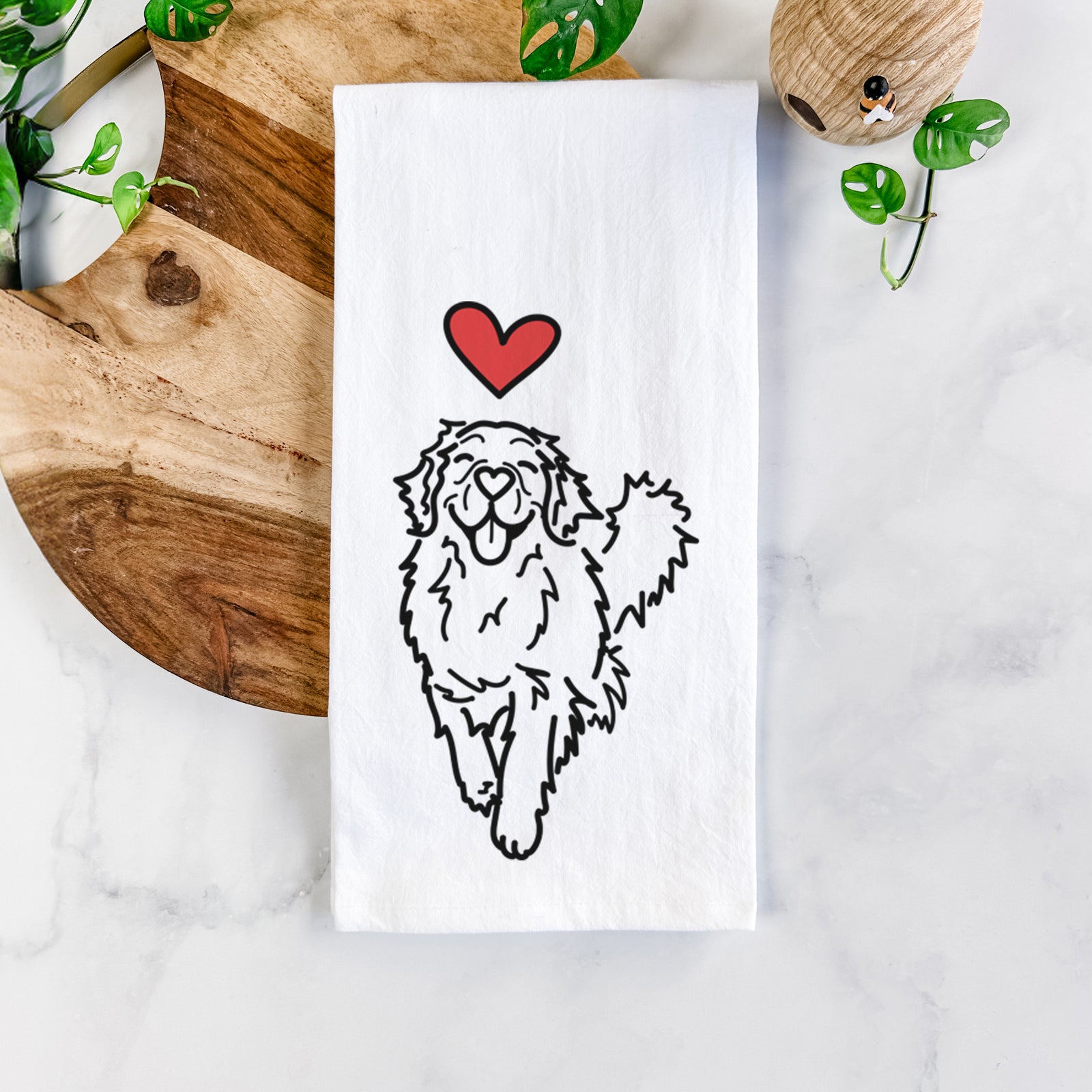 Minimalist line drawing of Hamlet the Golden Retriever with a red heart on a tea towel