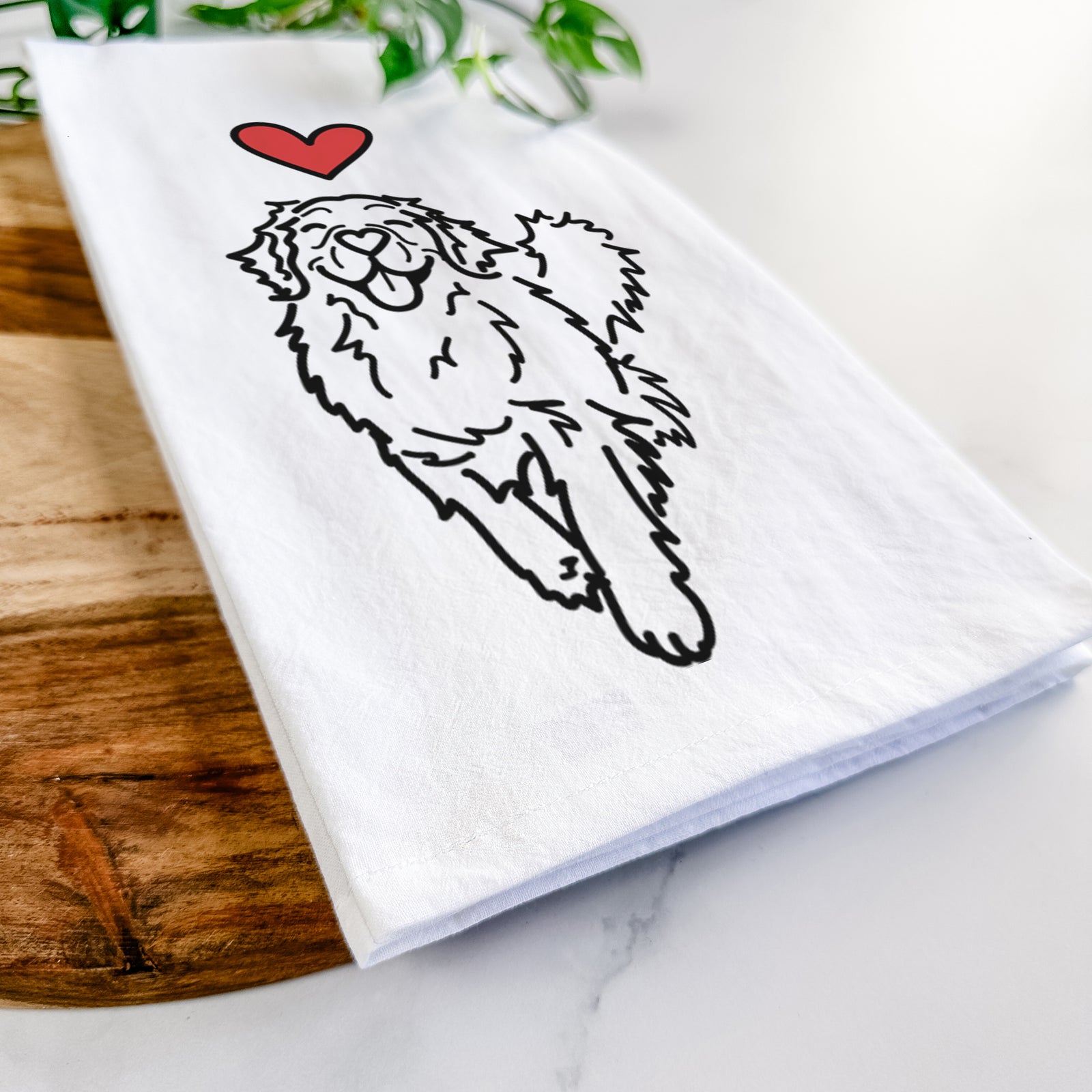 Minimalist line drawing of Hamlet the Golden Retriever with a red heart on a tea towel