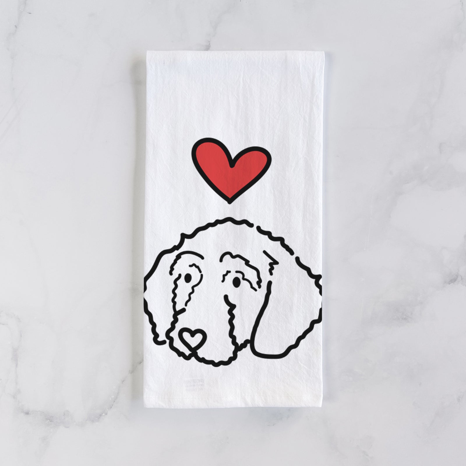 Minimalist line drawing of Hanna the Goldendoodle with a red heart on a tea towel