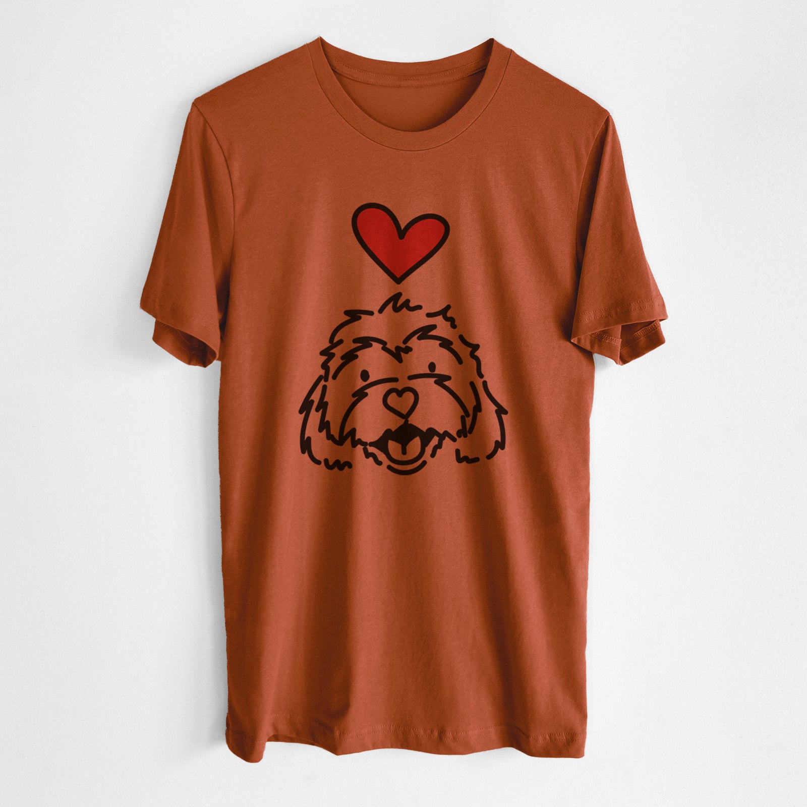 Minimalist line drawing of Harry the Cavachon with a red heart on an Autumn Unisex crewneck, worn by a man
