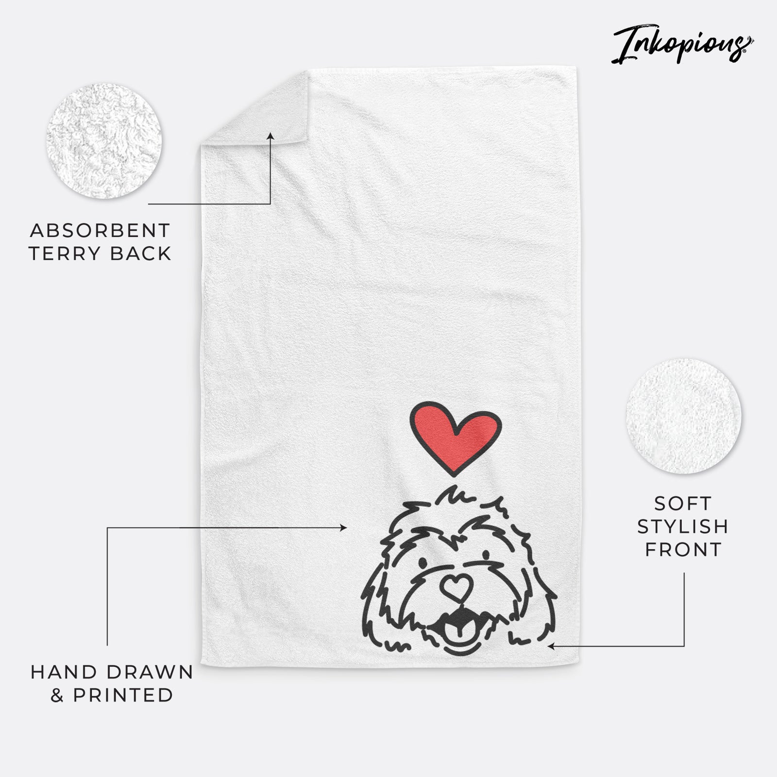 Minimalist line drawing of Harry the Cavachon with a red heart on a hand towel