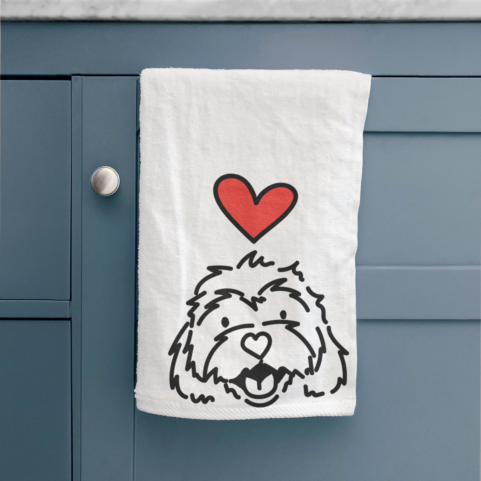 Minimalist line drawing of Harry the Cavachon with a red heart on a hand towel
