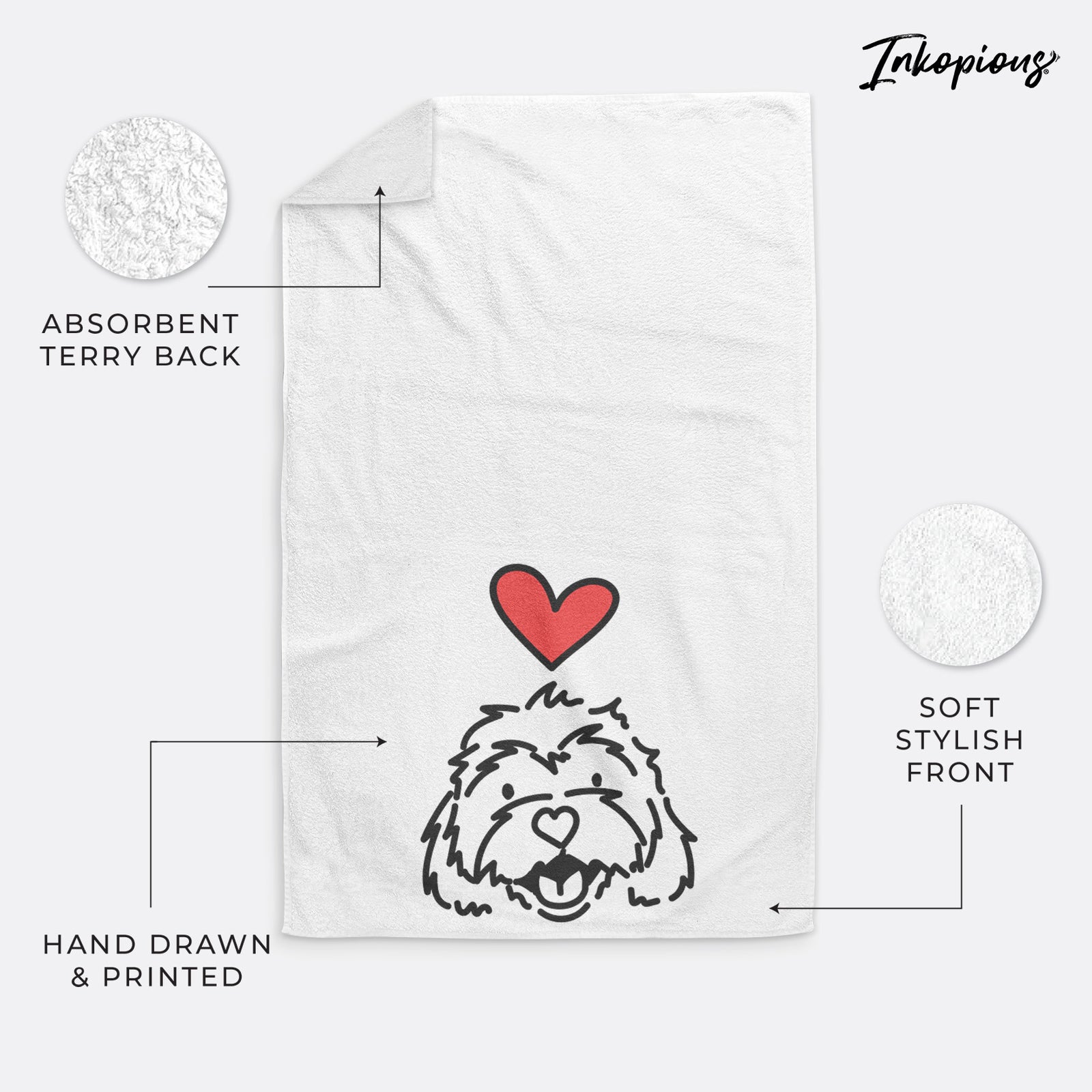 Minimalist line drawing of Harry the Cavachon with a red heart on a hand towel