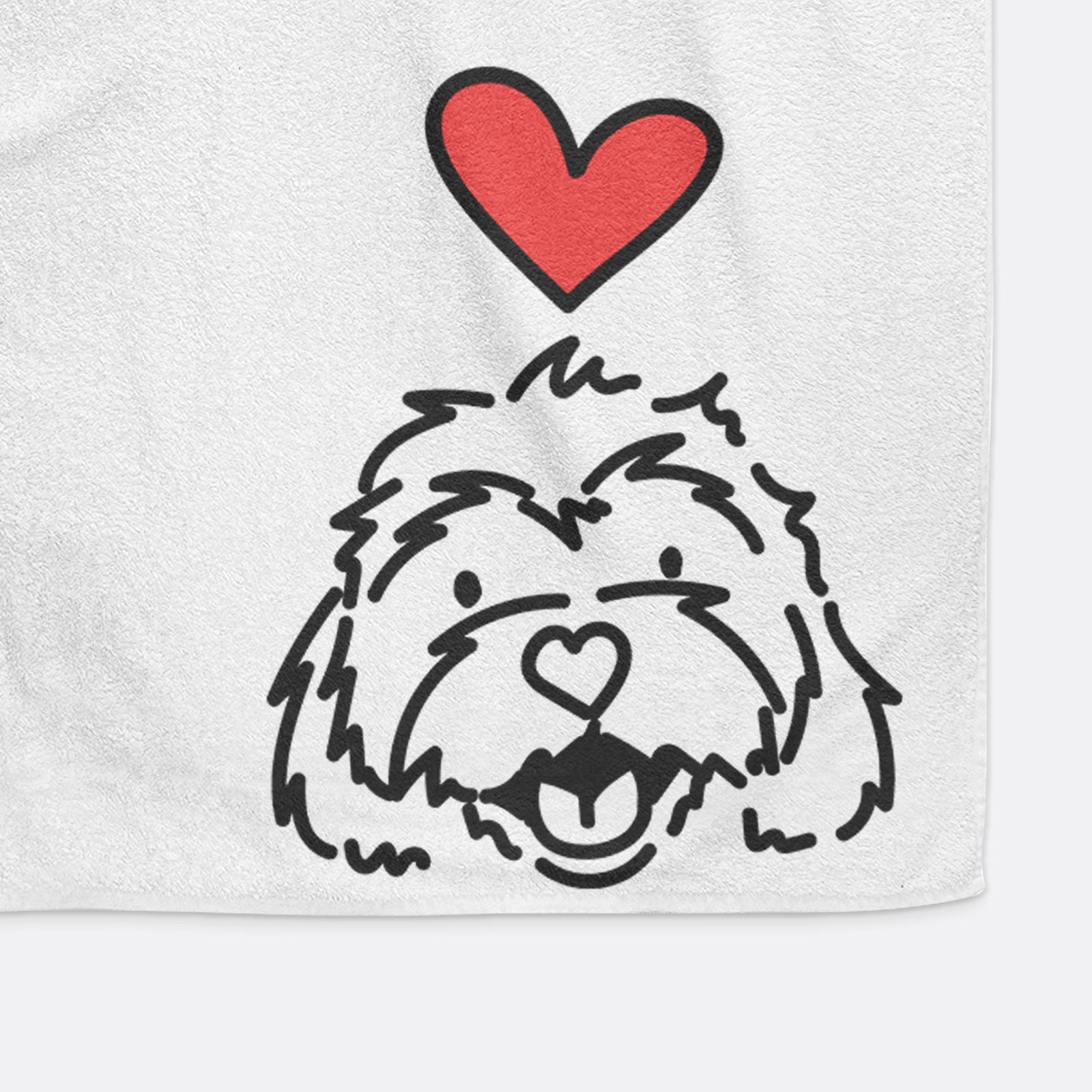 Minimalist line drawing of Harry the Cavachon with a red heart on a hand towel