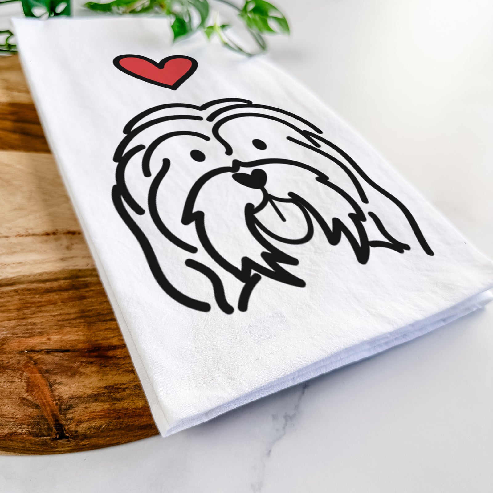 Minimalist line drawing of a Havanese with a red heart on a tea towel