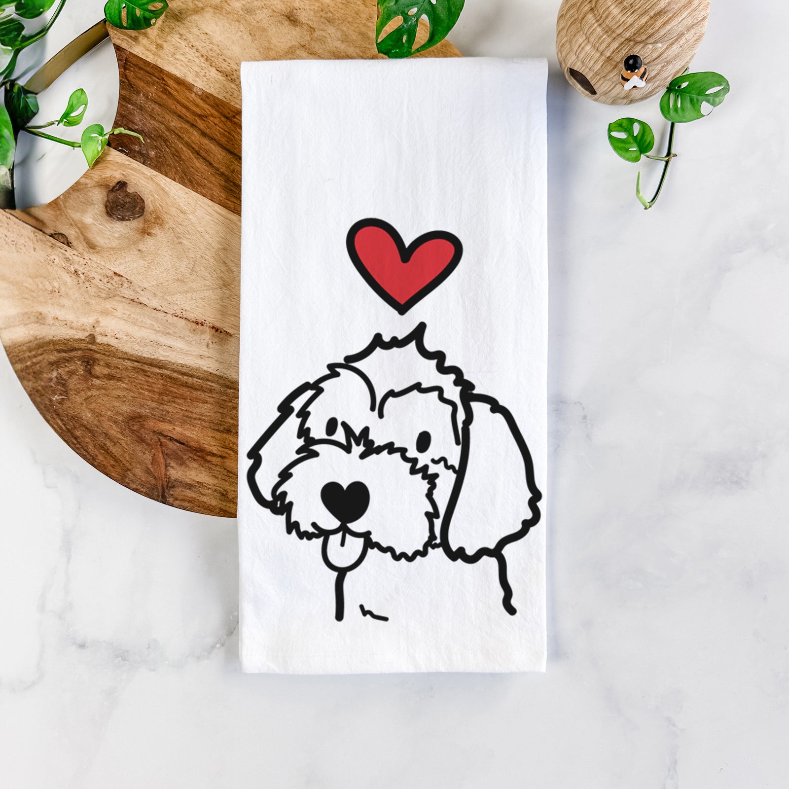 Minimalist line drawing of a Havapoo with a red heart on a tea towel