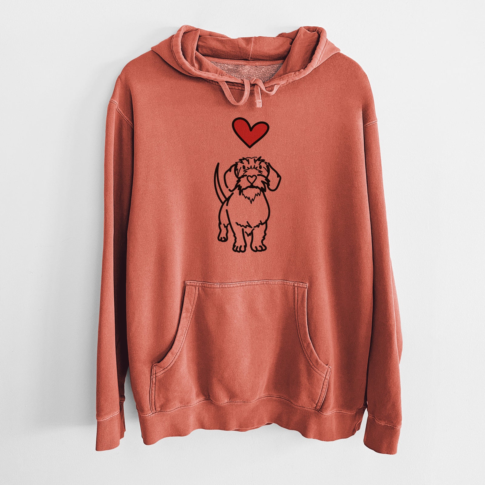 Minimalist line drawing of Henry the Wire Dachshund with a red heart on an Amber Unisex pigment dyed hoodie