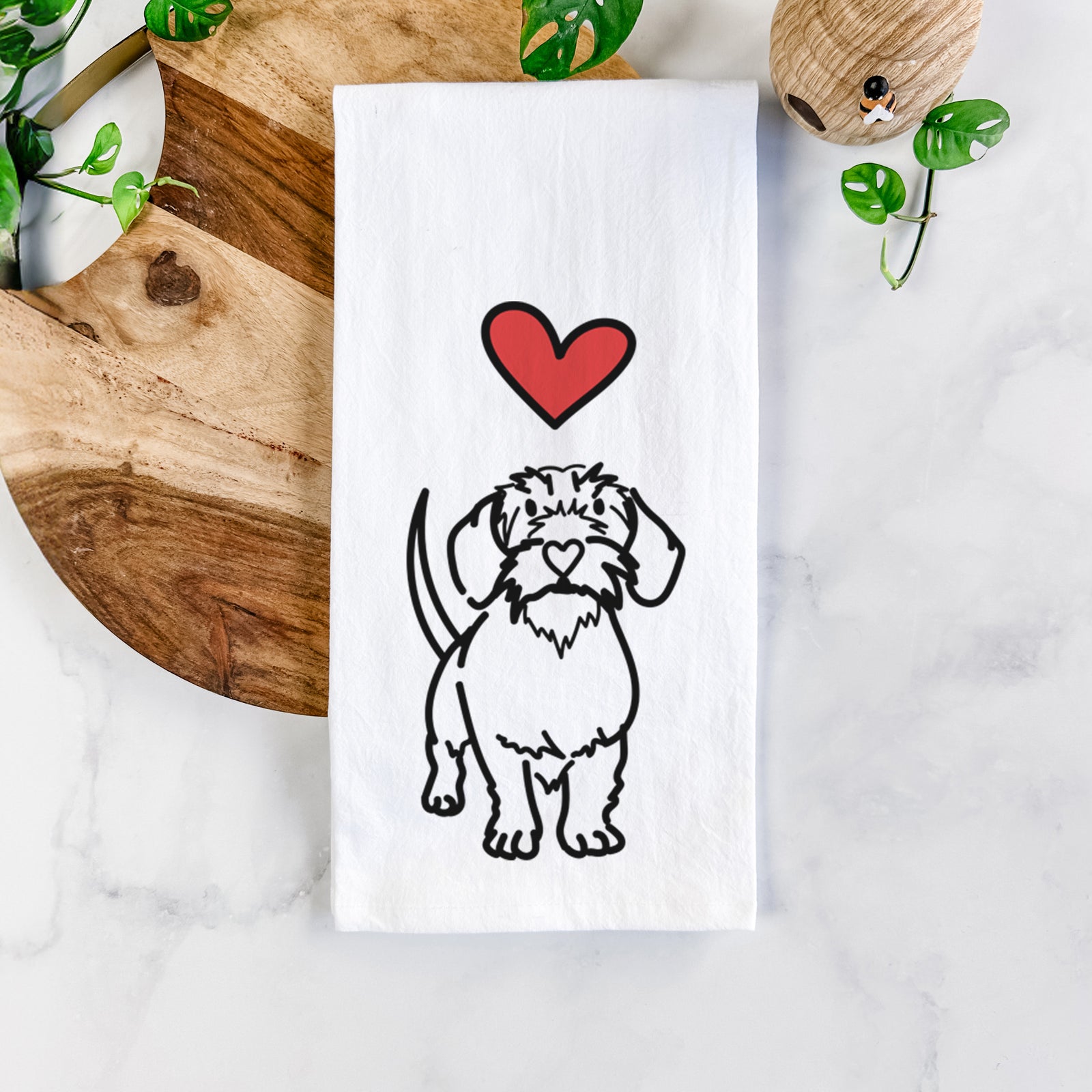 Minimalist line drawing of Henry the Wire Dachshund with a red heart on a tea towel