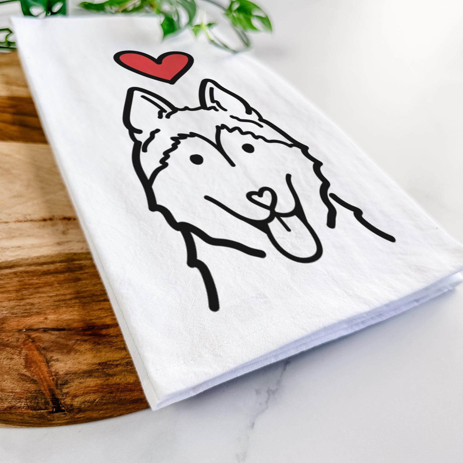 Minimalist line drawing of a Siberian Husky with a red heart on a tea towel