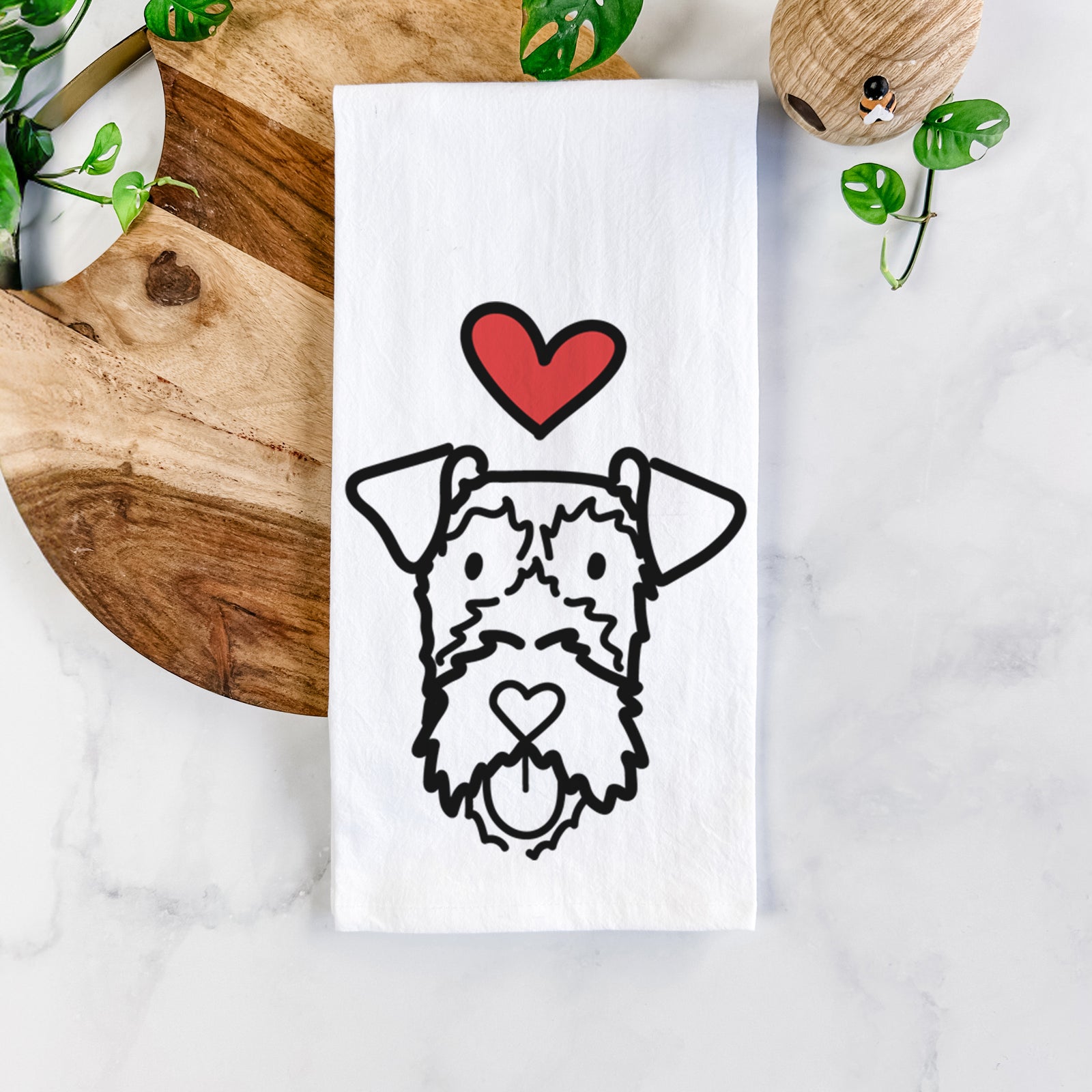 Minimalist line drawing of an Irish Terrier with a red heart on a tea towel