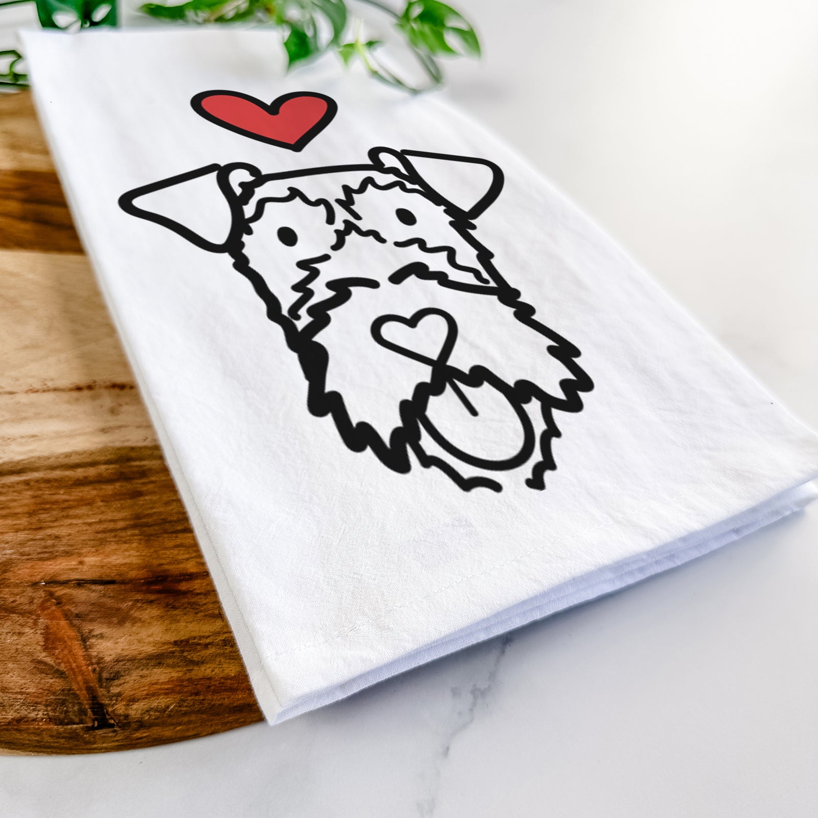 Minimalist line drawing of an Irish Terrier with a red heart on a tea towel