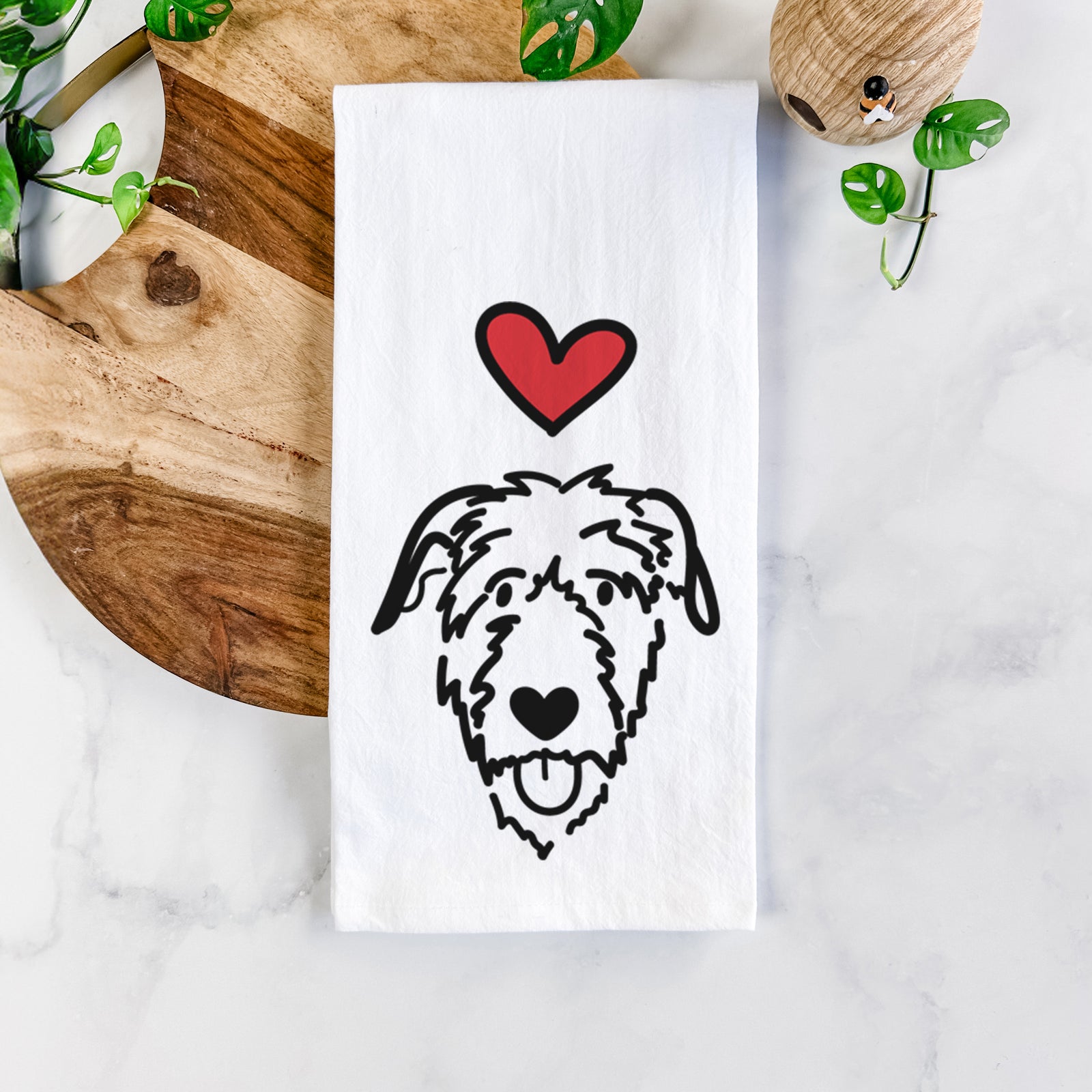 Minimalist line drawing of an Irish Wolfhound with a red heart on a tea towel