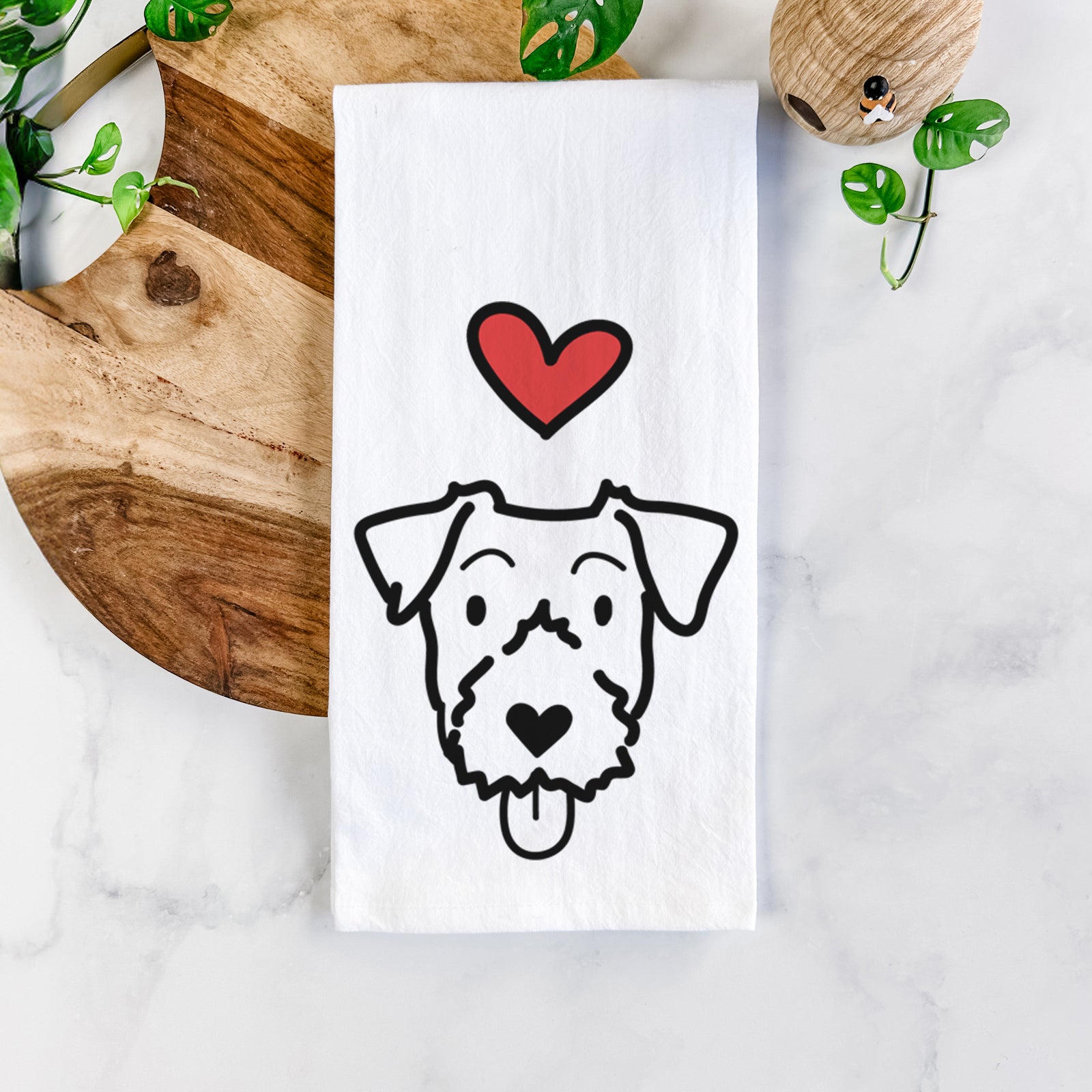 Minimalist line drawing of a Jack Russell Terrier with a red heart on a tea towel