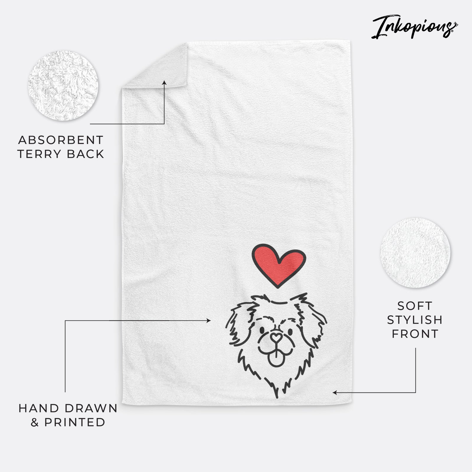 Minimalist line drawing of Jiji the Tibetan Spaniel with a red heart on a decorative hand towel