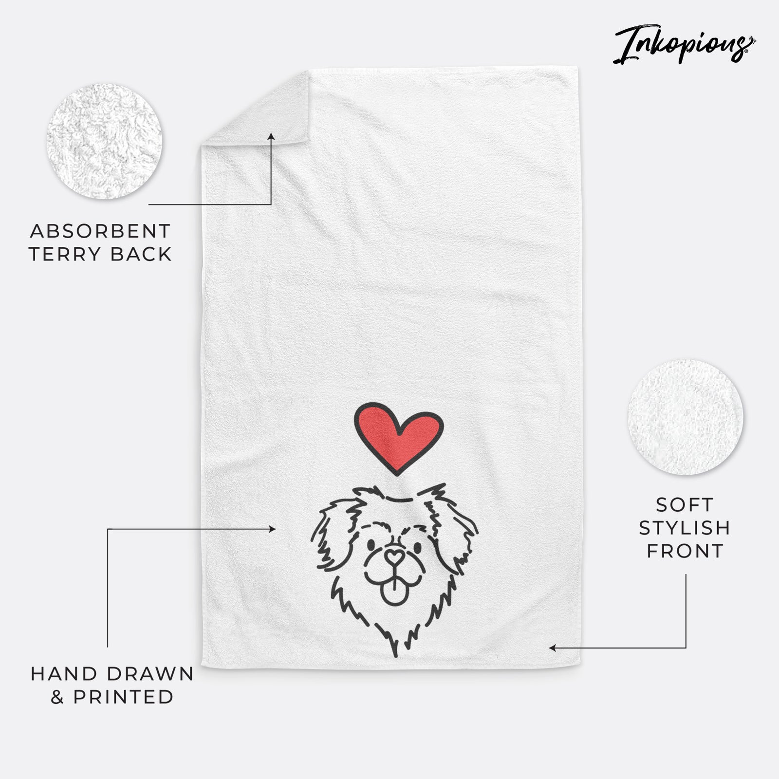 Minimalist line drawing of Jiji the Tibetan Spaniel with a red heart on a decorative hand towel
