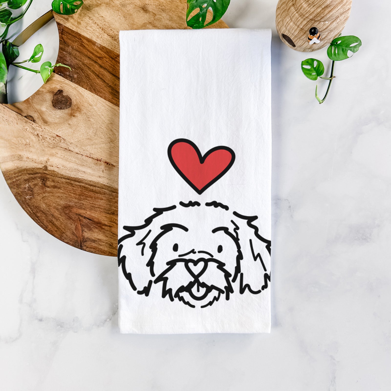 Minimalist line drawing of Jo Jo the Peekapoo with a red heart on a tea towel