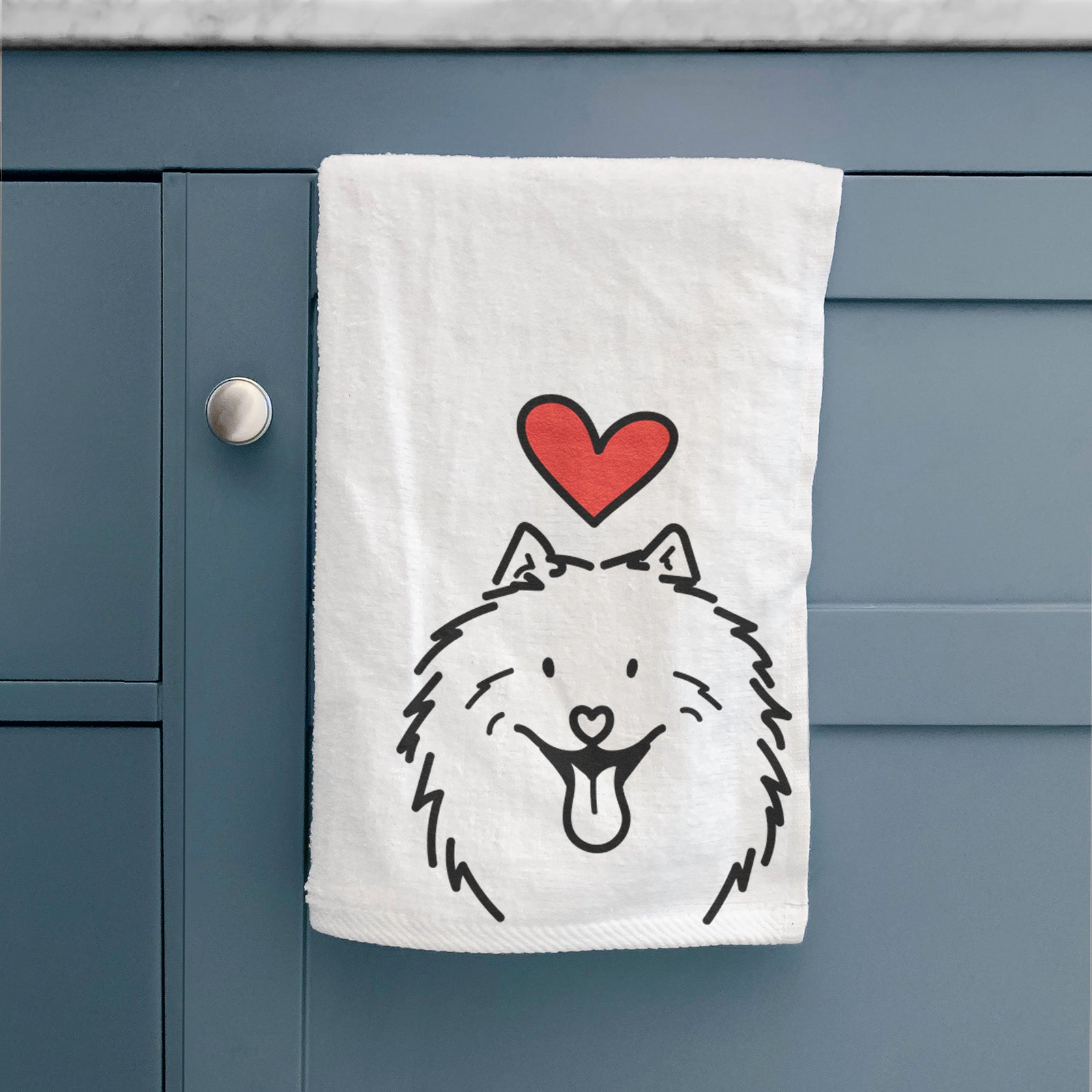Minimalist line drawing of Johnny the Samoyed with a red heart on a hand towel