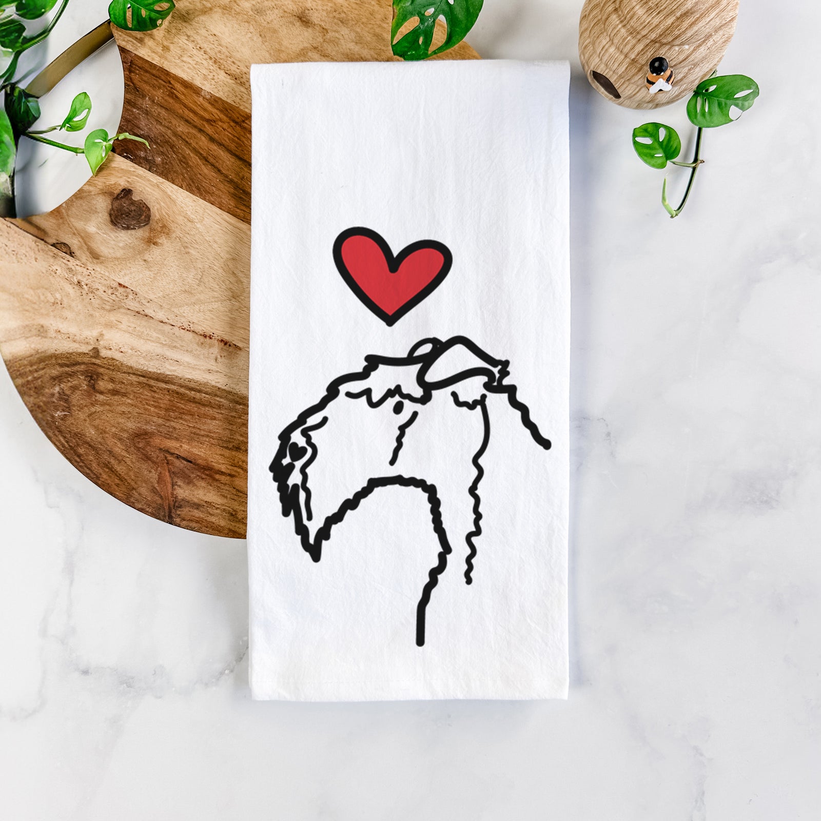 Minimalist line drawing of a Kerry Blue Terrier with a red heart on a tea towel