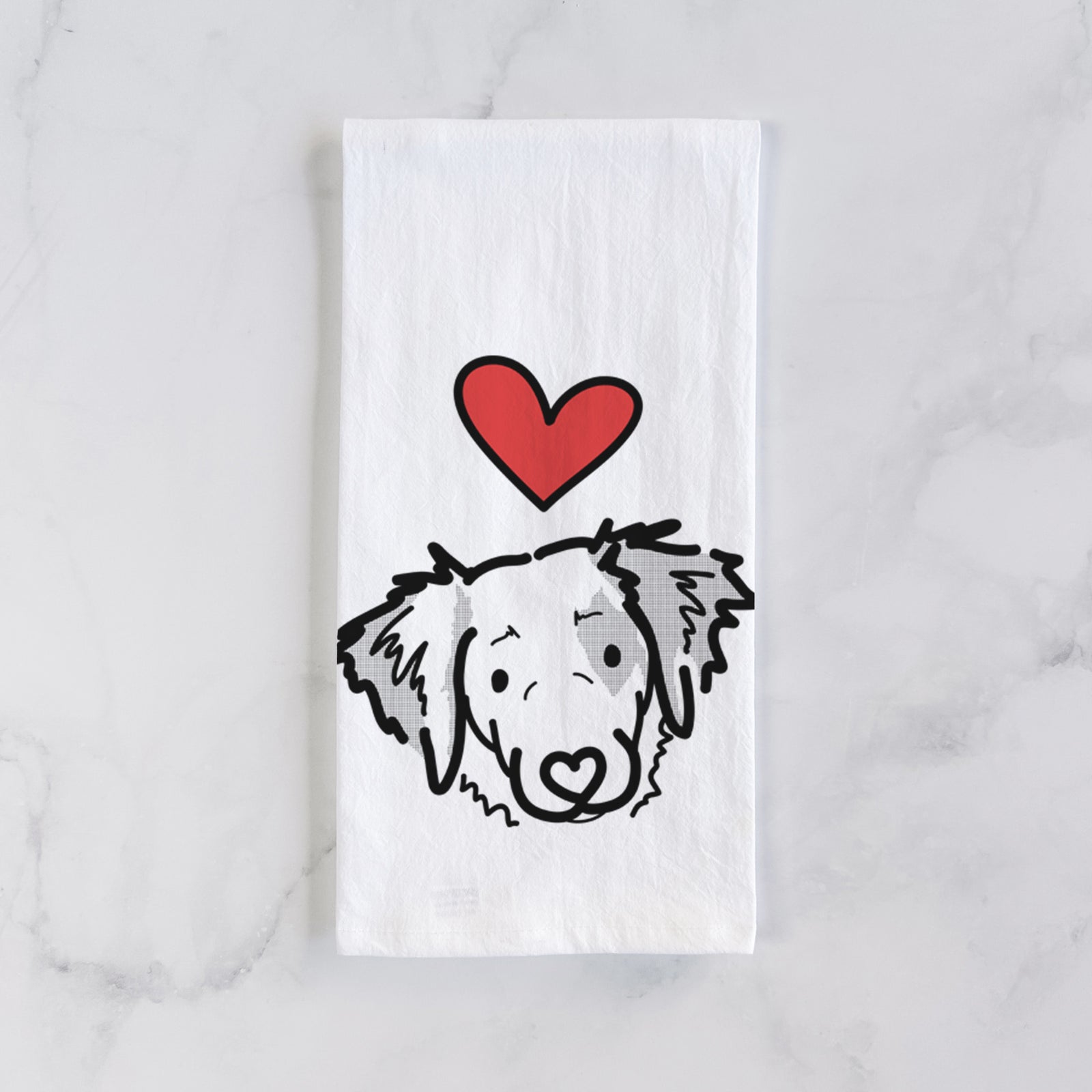 Minimalist line drawing of Kiva the Brittany Spaniel with a red heart on a tea towel