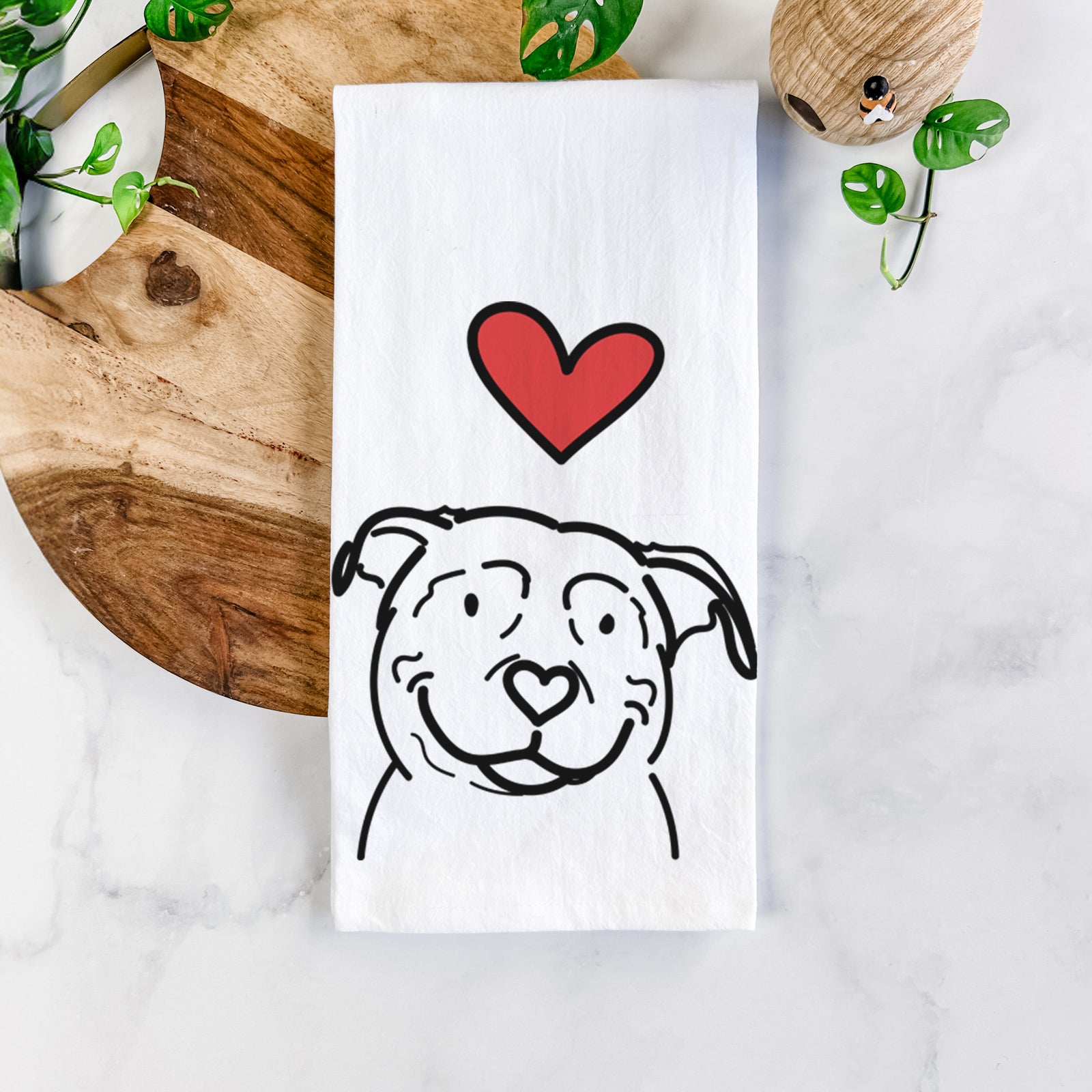 Minimalist line drawing of Lady the American Pitbull Terrier with a red heart on a tea towel