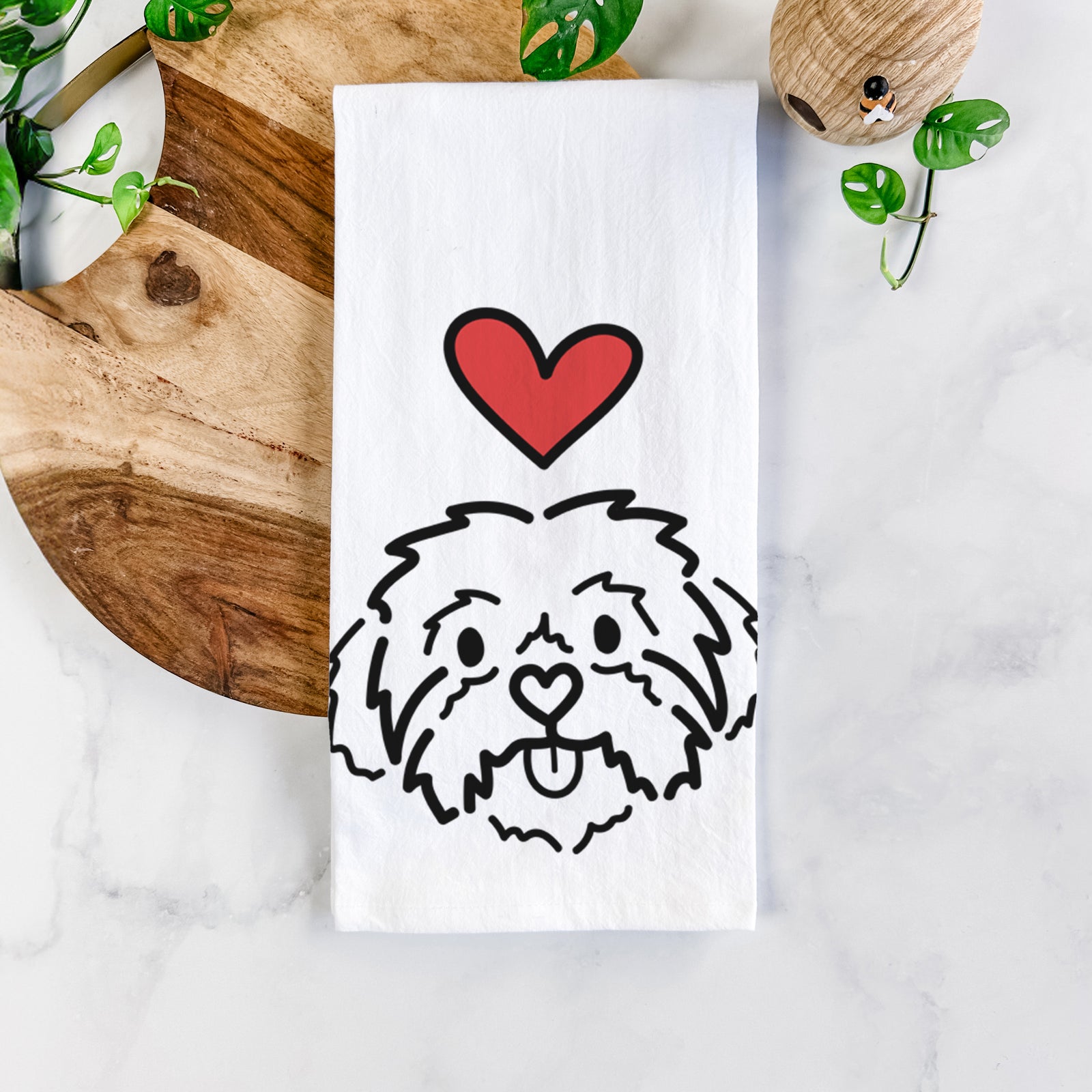 Minimalist line drawing of Leo the Shih Tzu with a red heart on a tea towel