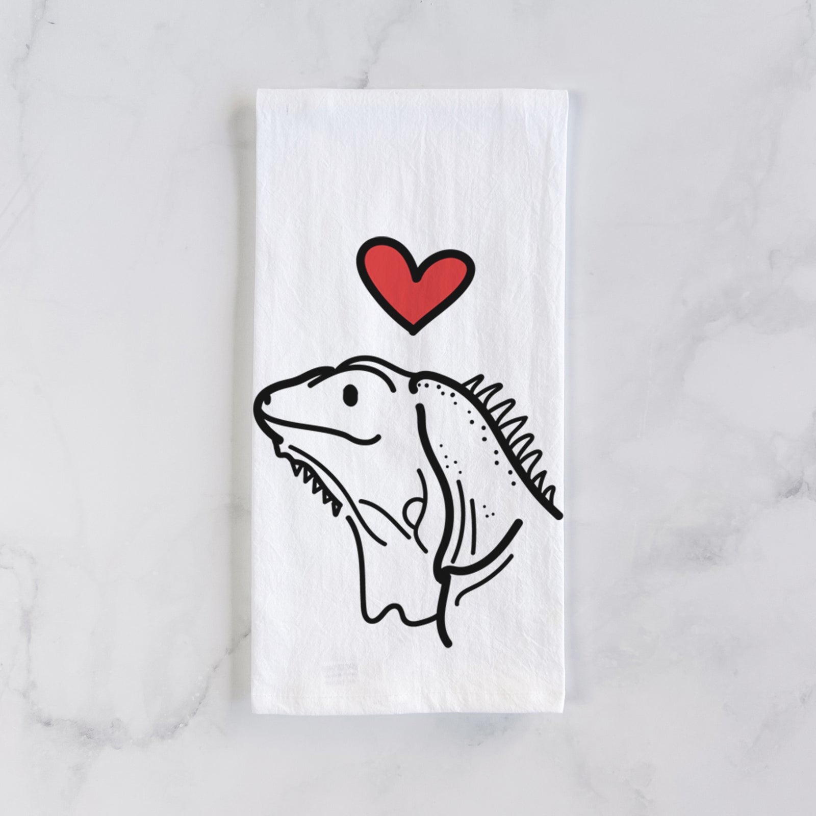 Minimalist line drawing of Louie the Iguana with a red heart on a tea towel