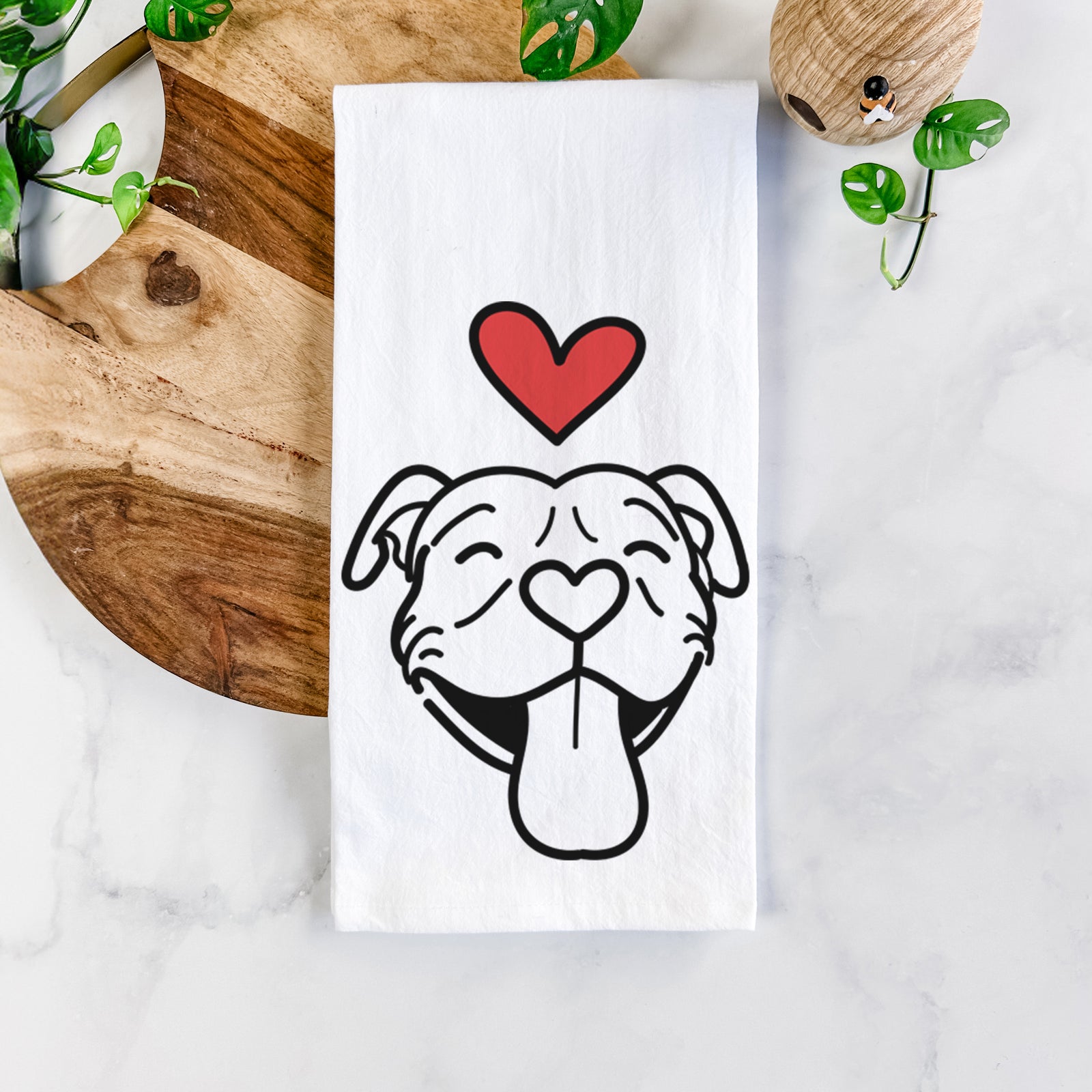 Minimalist line drawing of Louie the Pitbull with a red heart on a tea towel