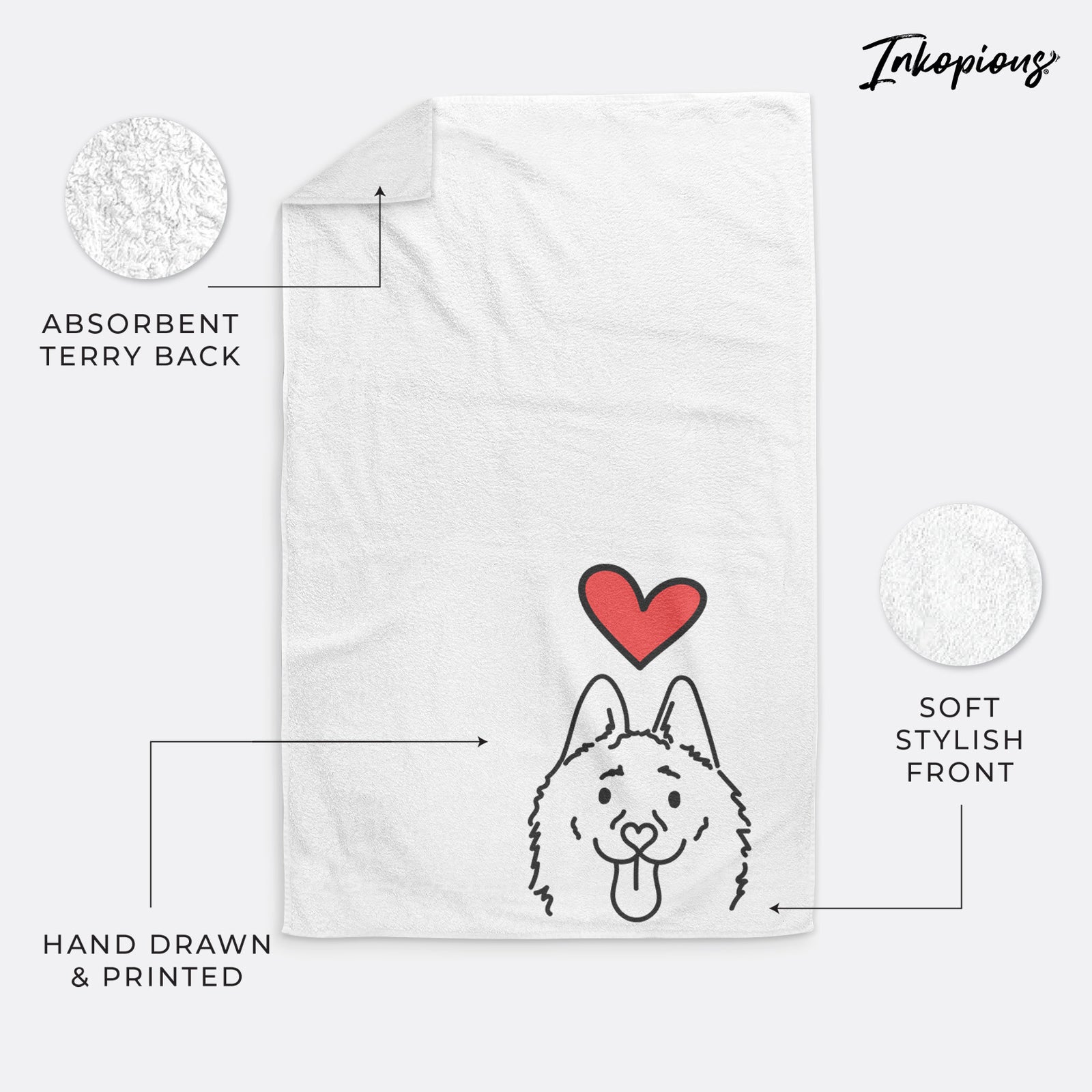 Minimalist line drawing of Meeko the Schipperke with a red heart on a decorative hand towel