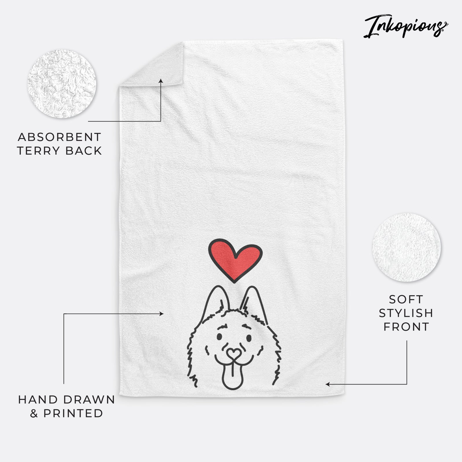 Minimalist line drawing of Meeko the Schipperke with a red heart on a decorative hand towel