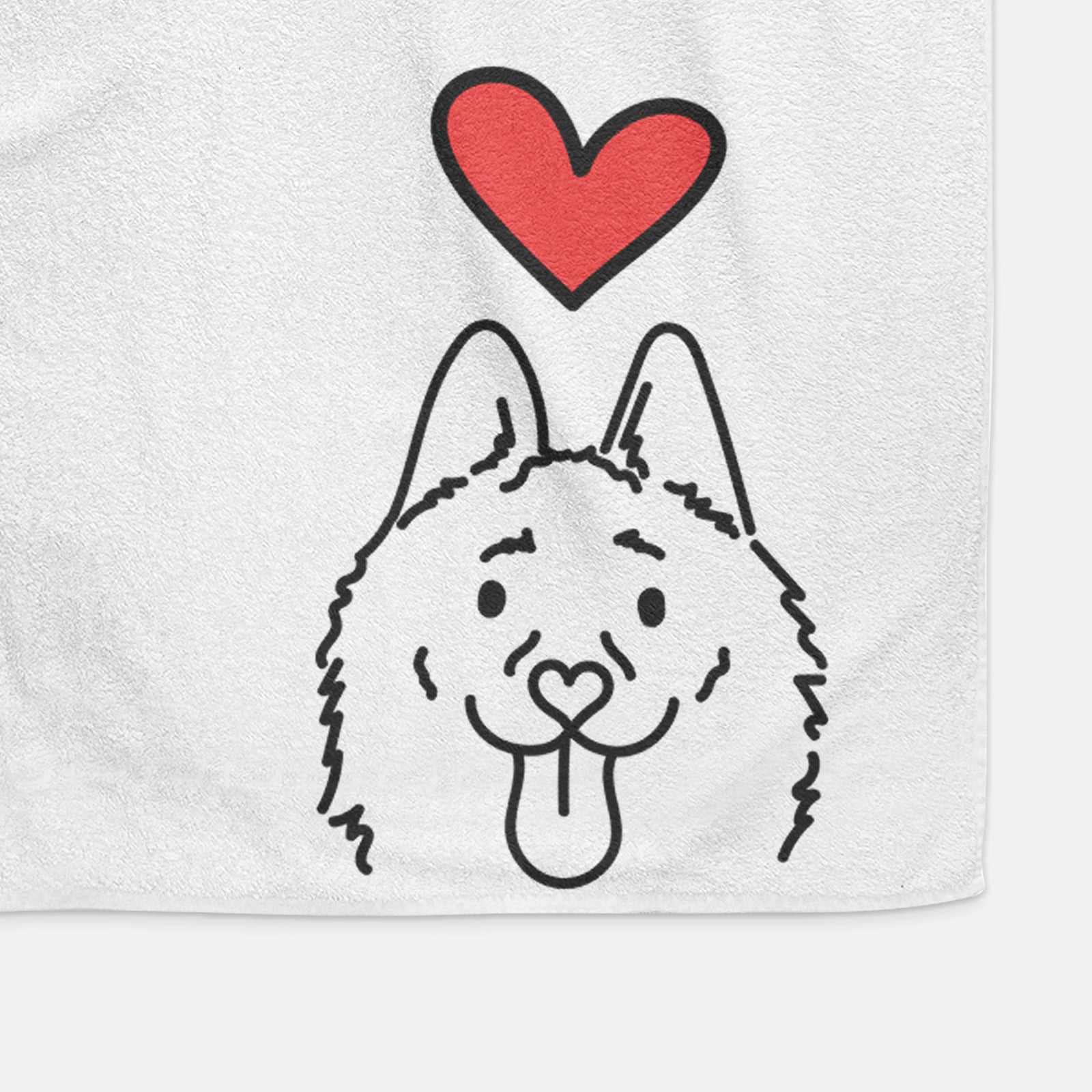 Minimalist line drawing of Meeko the Schipperke with a red heart on a decorative hand towel
