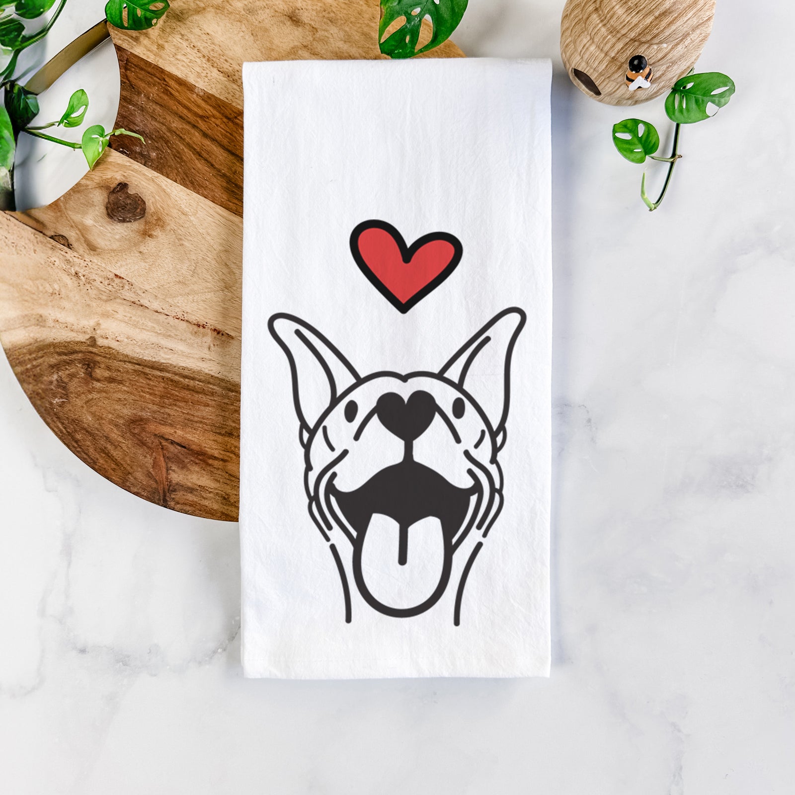 Minimalist line drawing of Merlin the Basenji with a red heart on a tea towel
